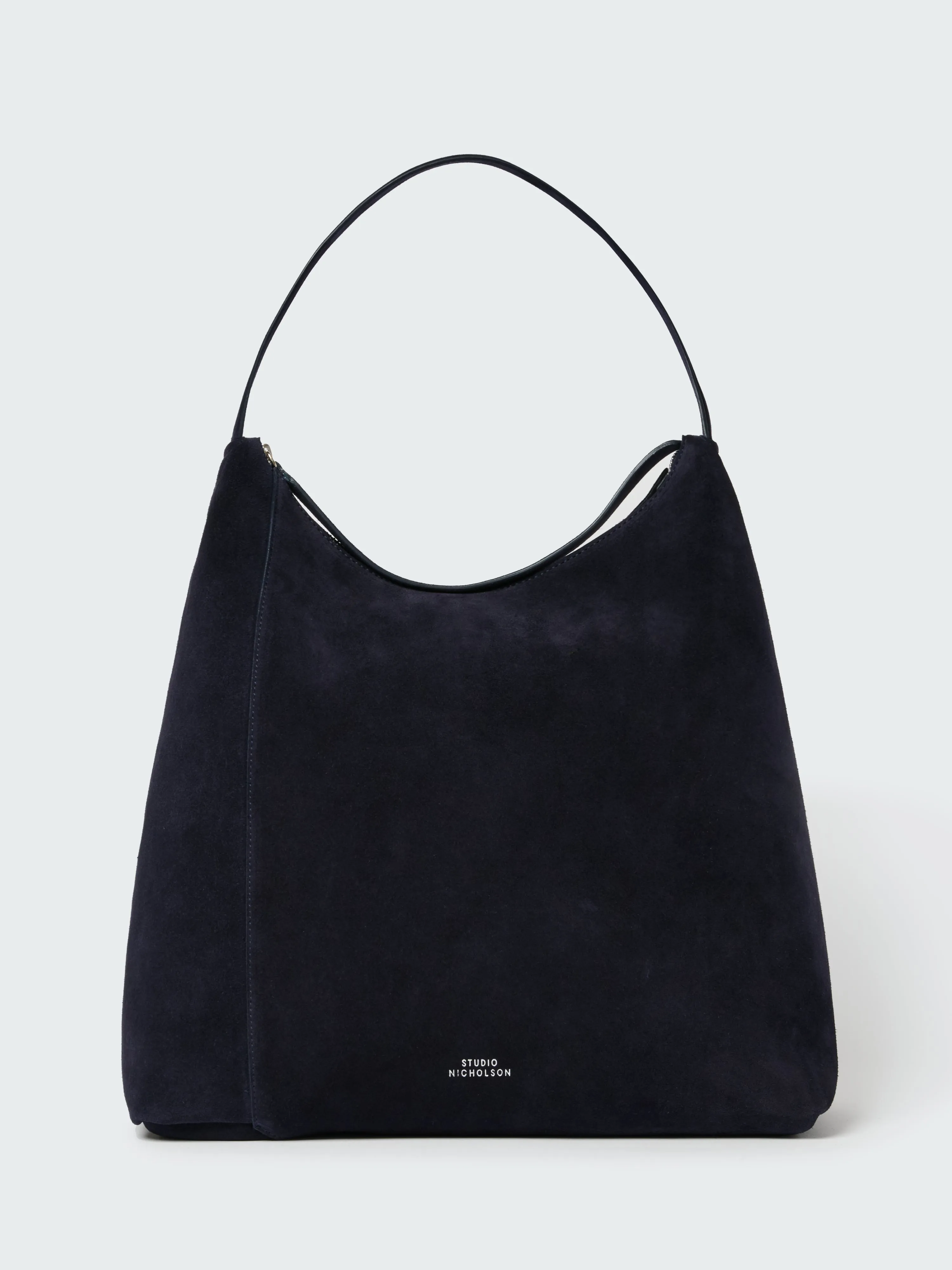 Hobo Type 1 Suede Bag in Darkest Navy sold by Studio Nicholson
