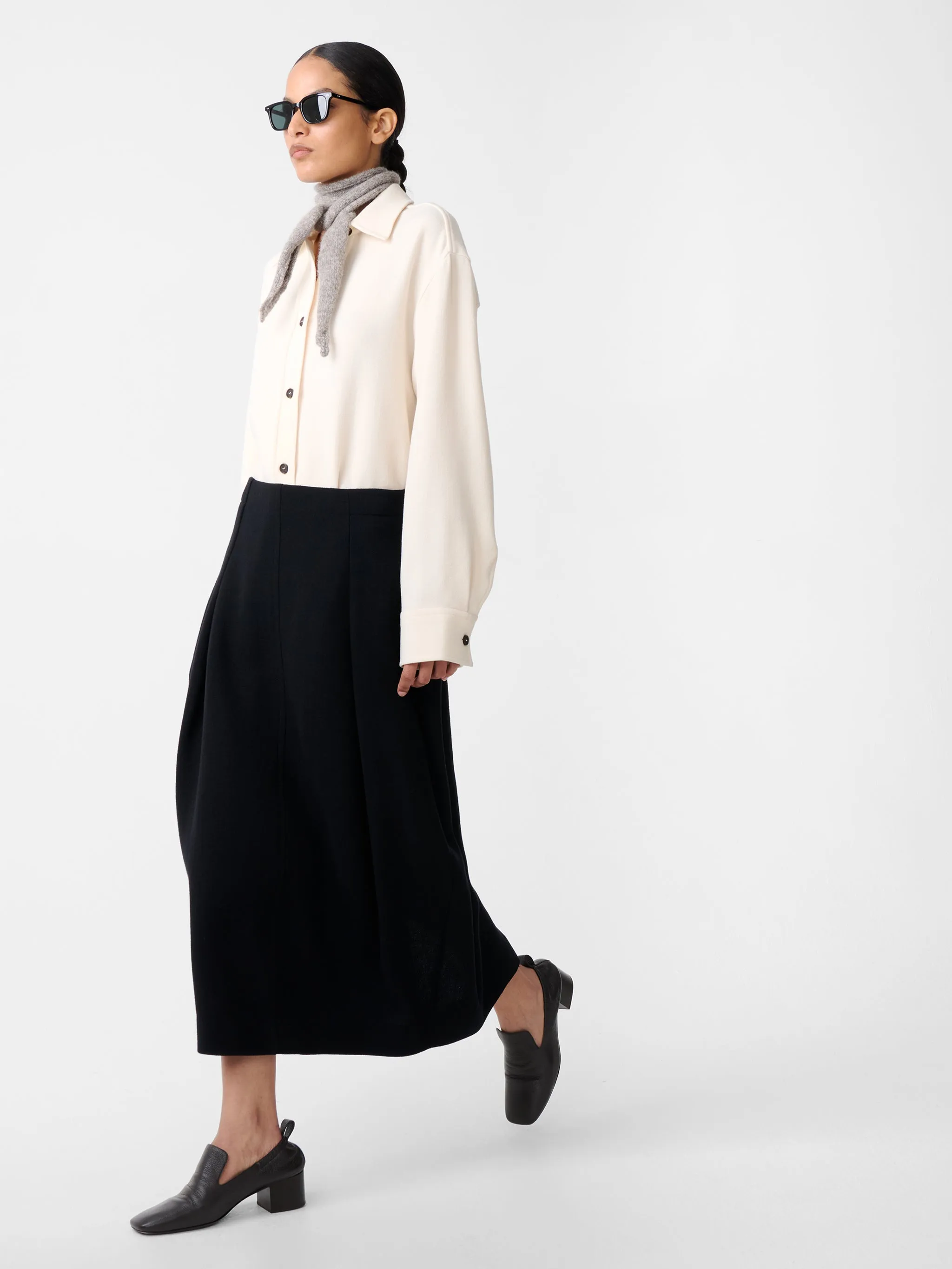 Aru Skirt in Black sold by Studio Nicholson