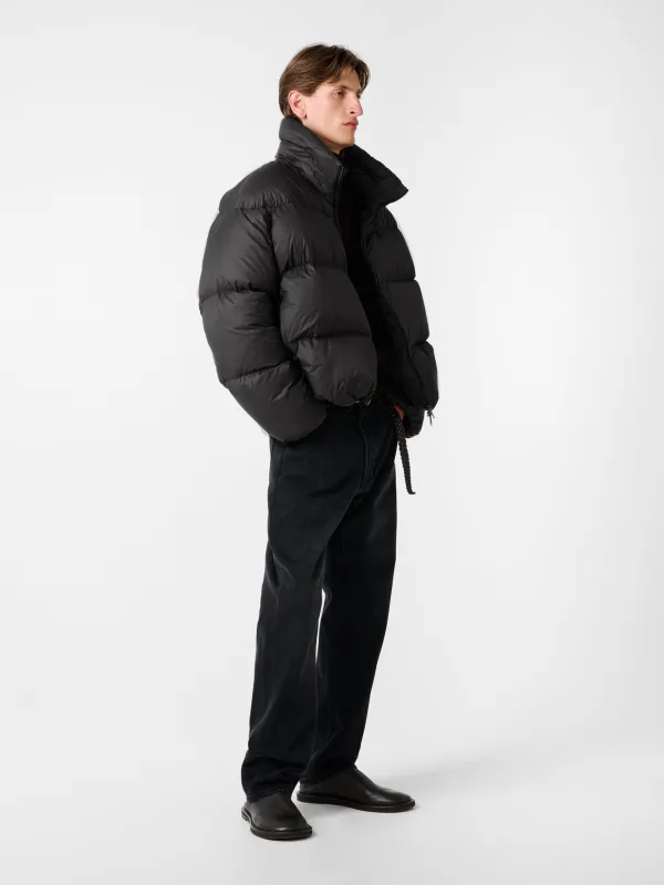 Massey Puffer Jacket in Black sold by Studio Nicholson