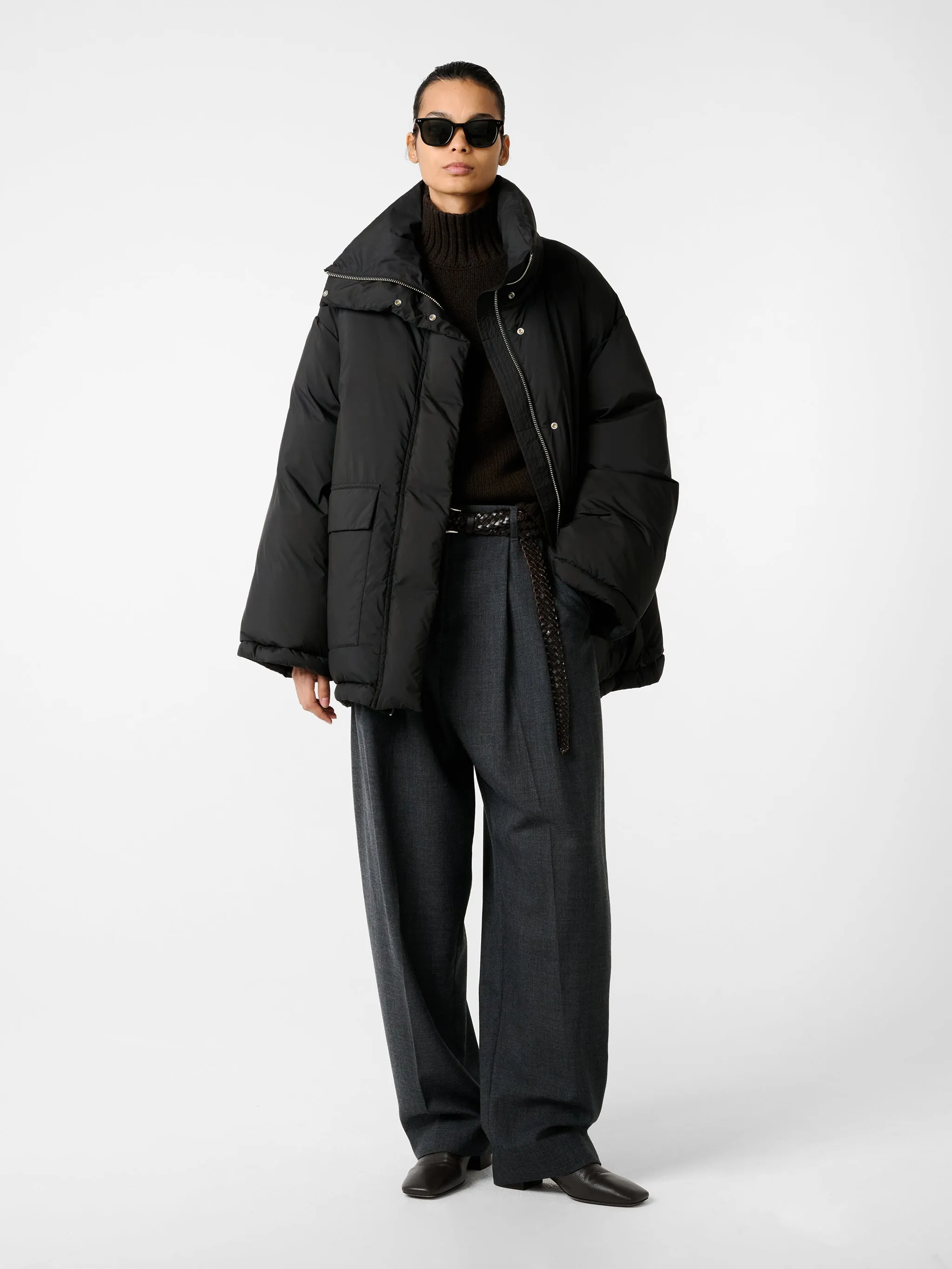 Elk Puffer Jacket in Black sold by Studio Nicholson