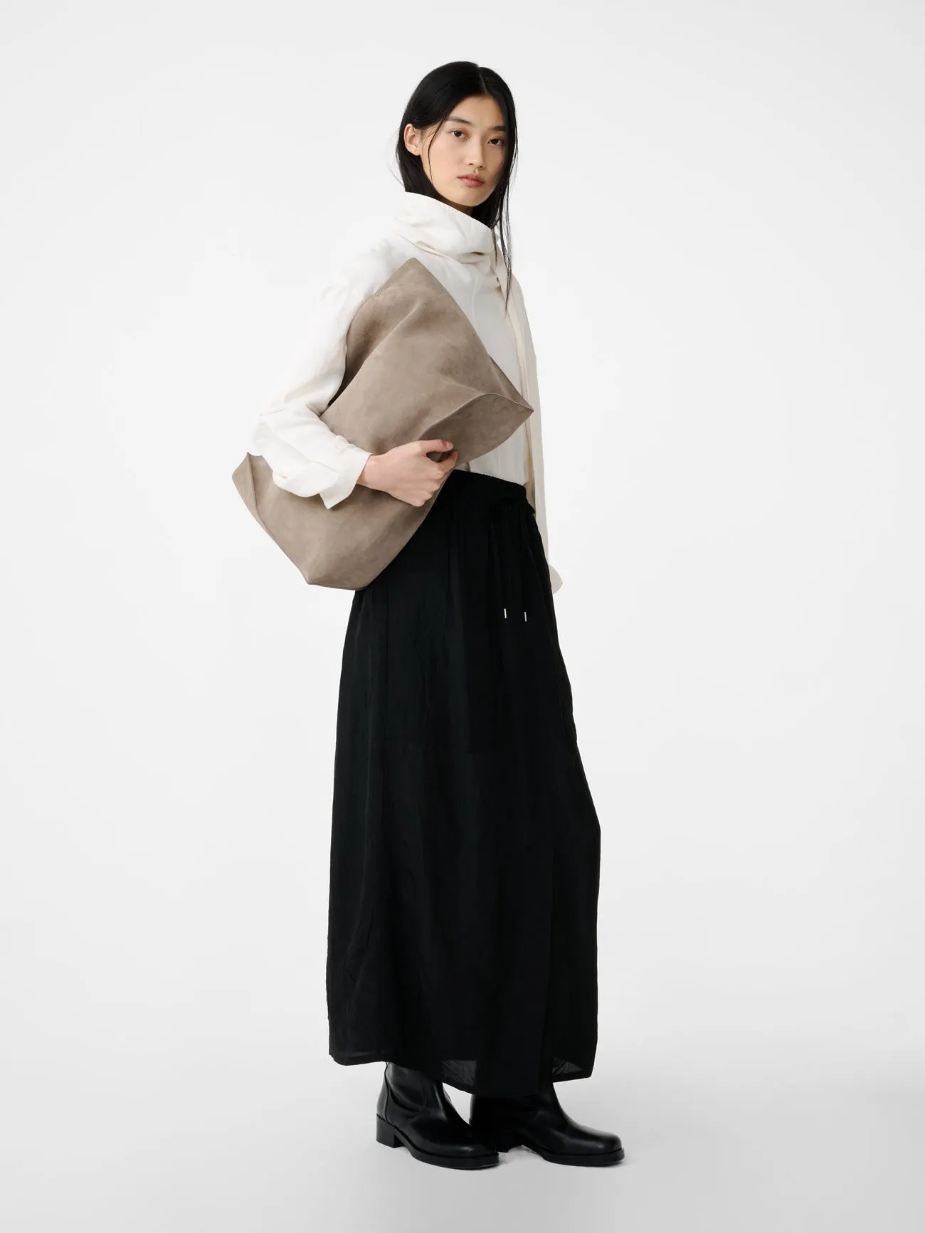 Oates Skirt in Darkest Black sold by Studio Nicholson product image thumbnail 2