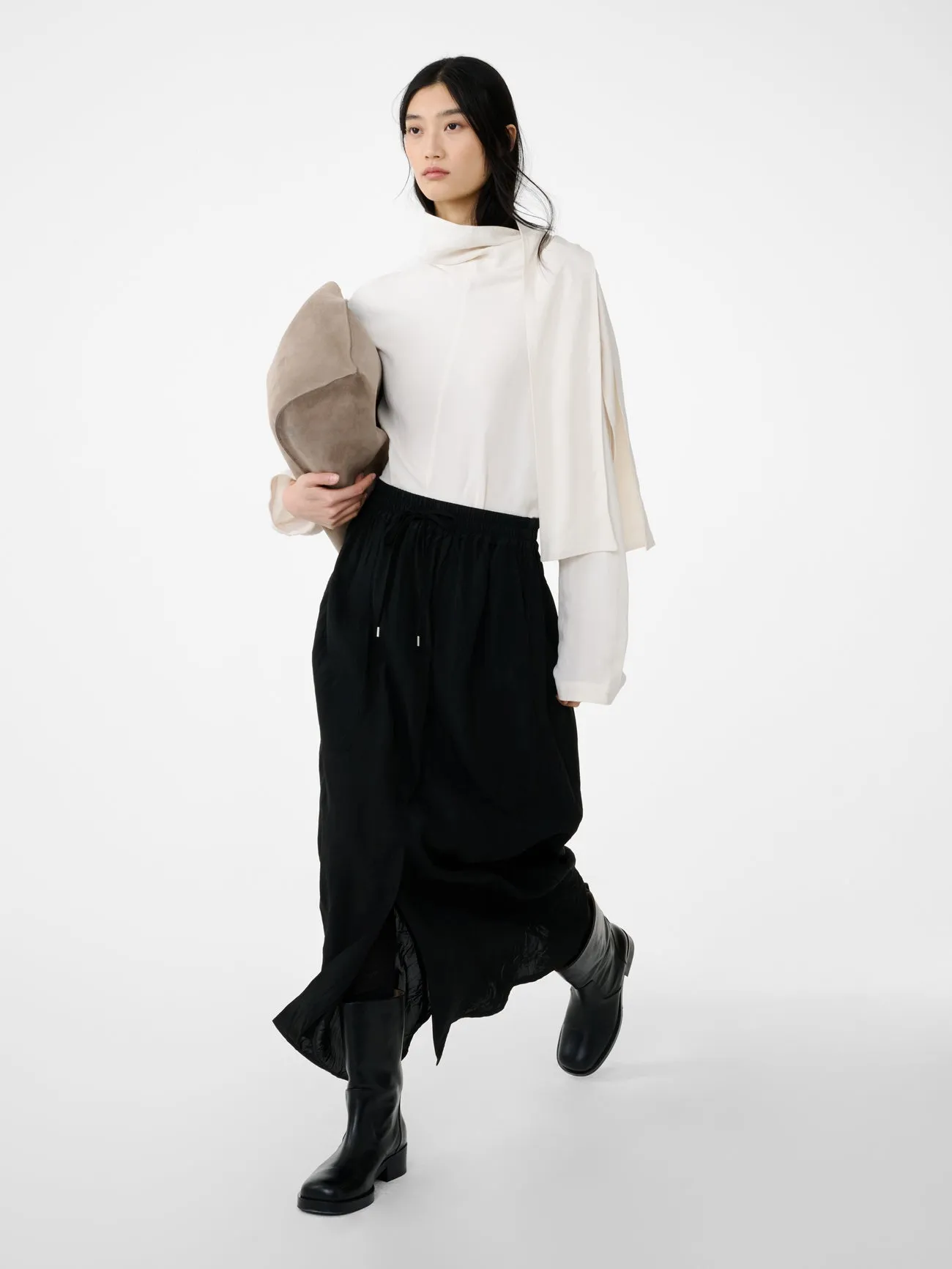 Oates Skirt in Darkest Black sold by Studio Nicholson