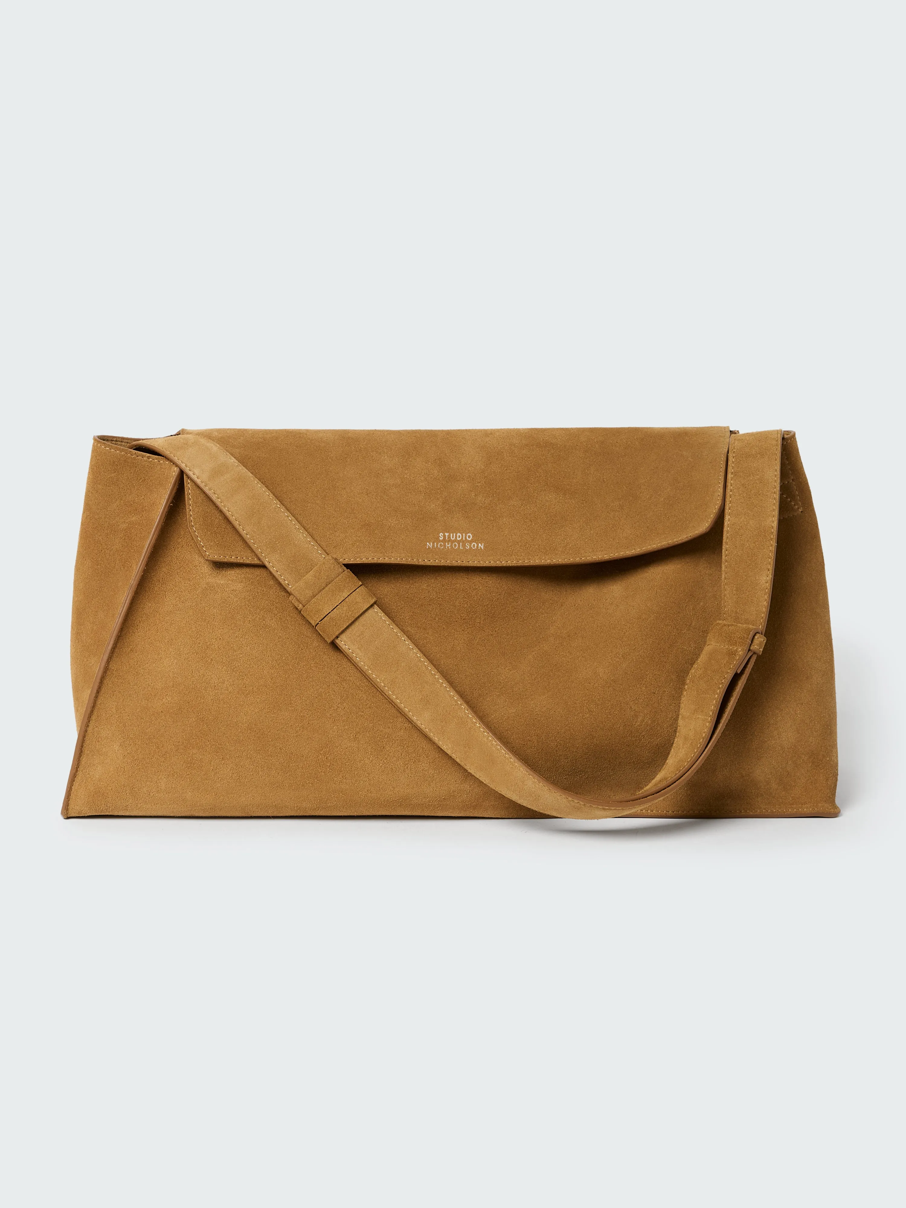 Shiboru Suede Bag in Sand sold by Studio Nicholson