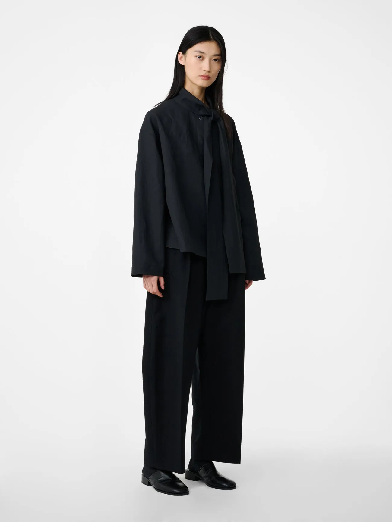 Minos Pant in Black sold by Studio Nicholson