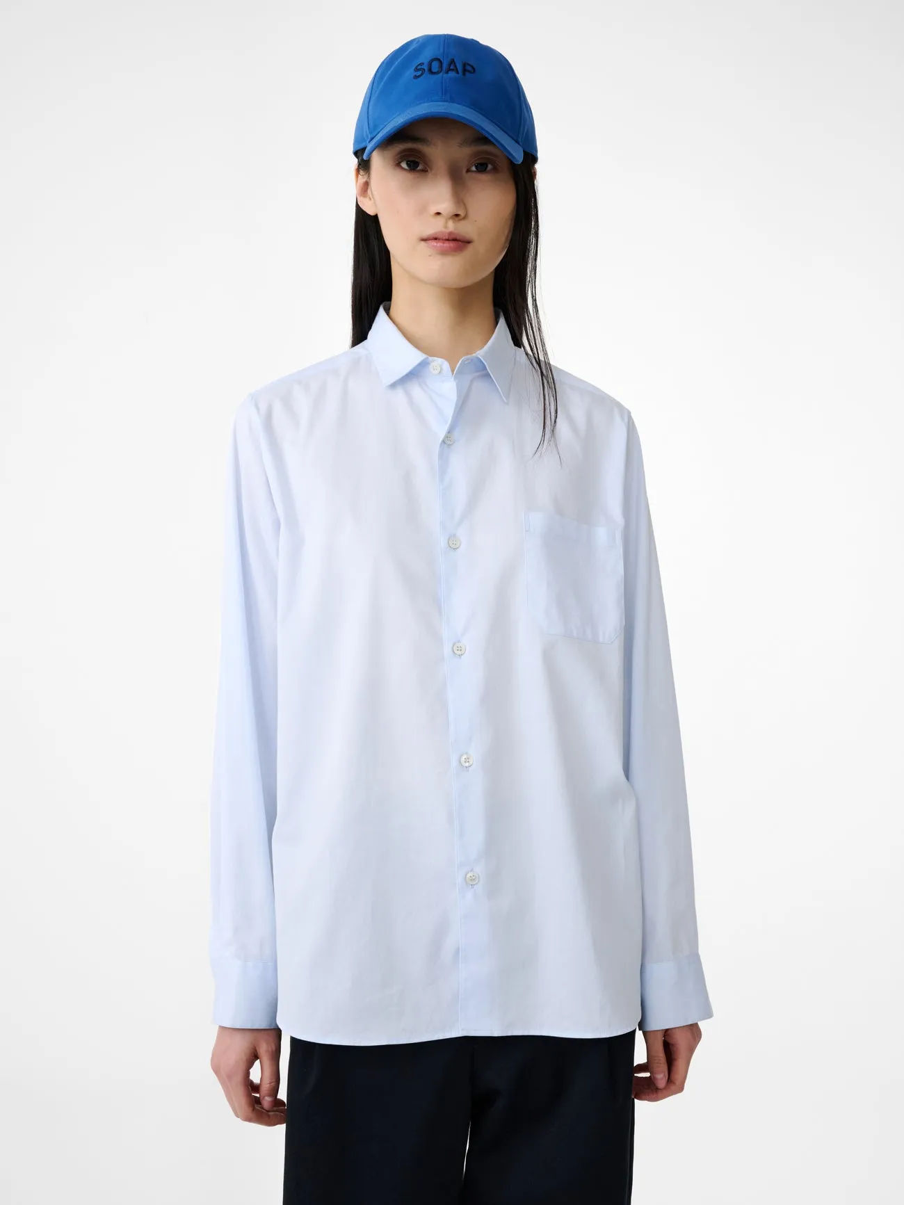 SN x PERFUMER H Cyclamen Shirt in Light Blue sold by Studio Nicholson