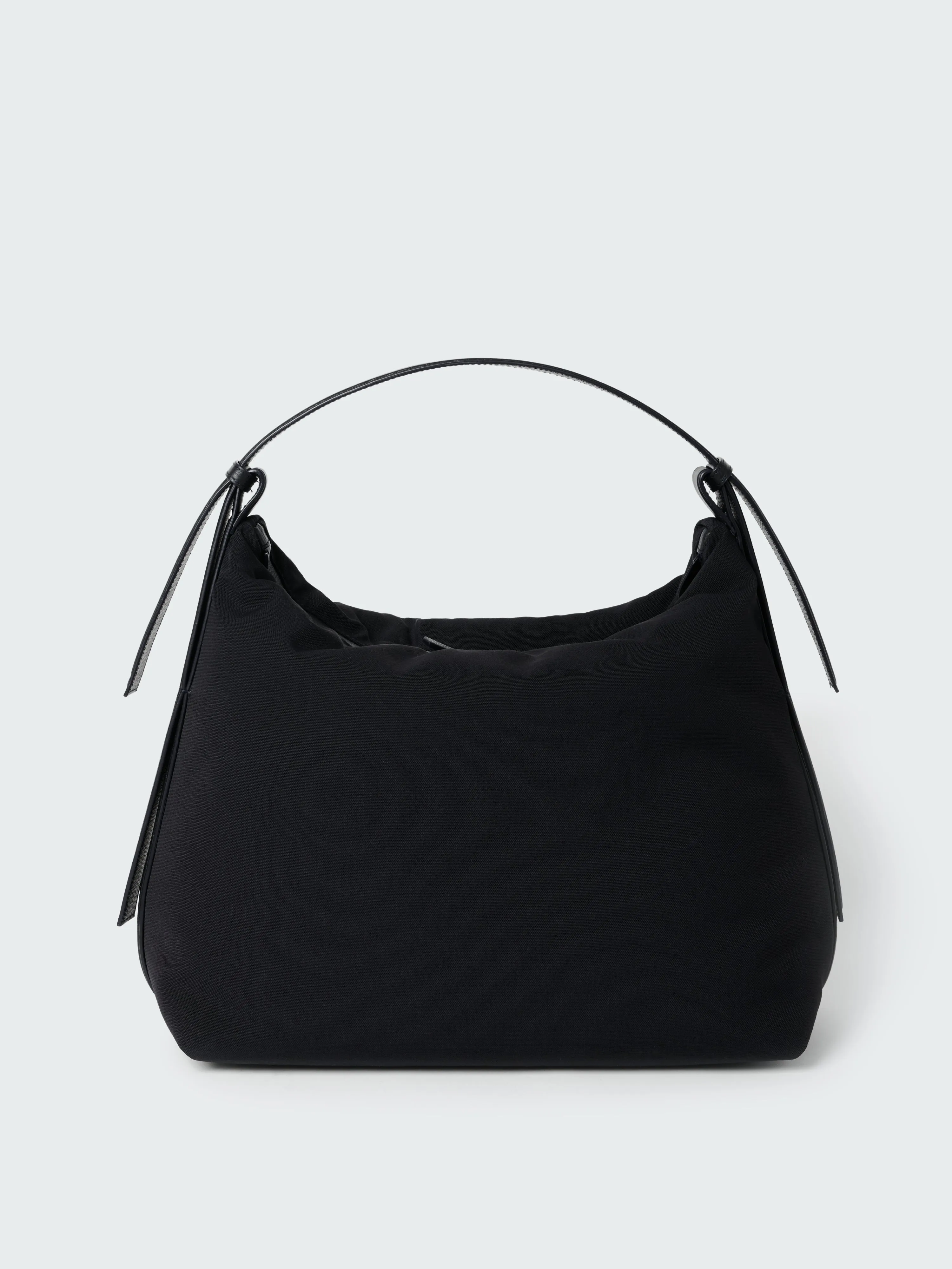 Transit Bag in Black sold by Studio Nicholson