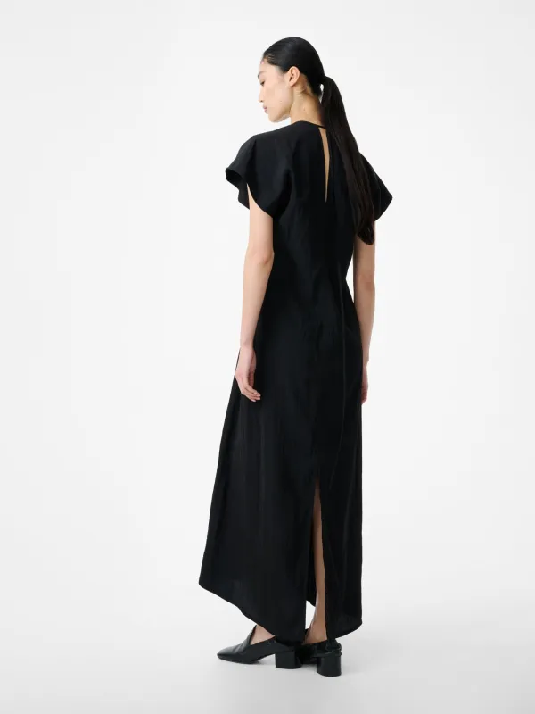 Surat Dress in Black made by Studio Nicholson