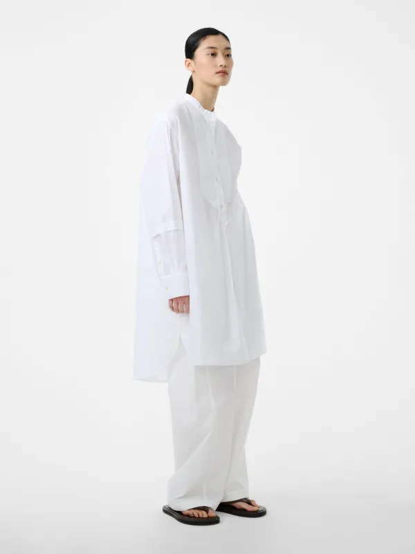 Lalon Dress in White made by Studio Nicholson