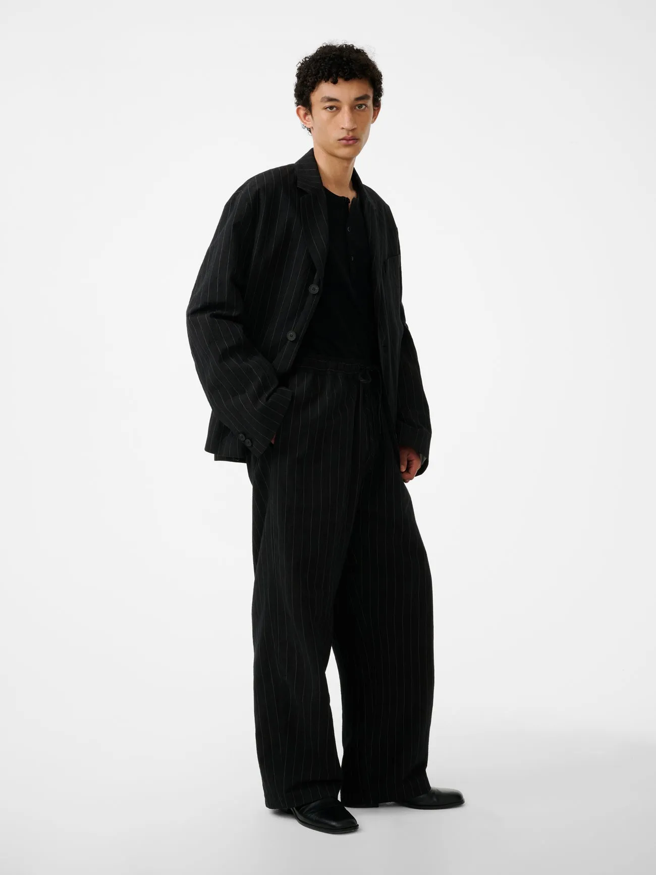 Sonny Pinstripe Pant in Black sold by Studio Nicholson