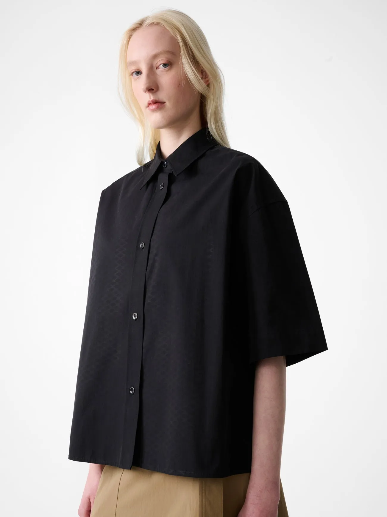 Tocoa Shirt in Black sold by Studio Nicholson