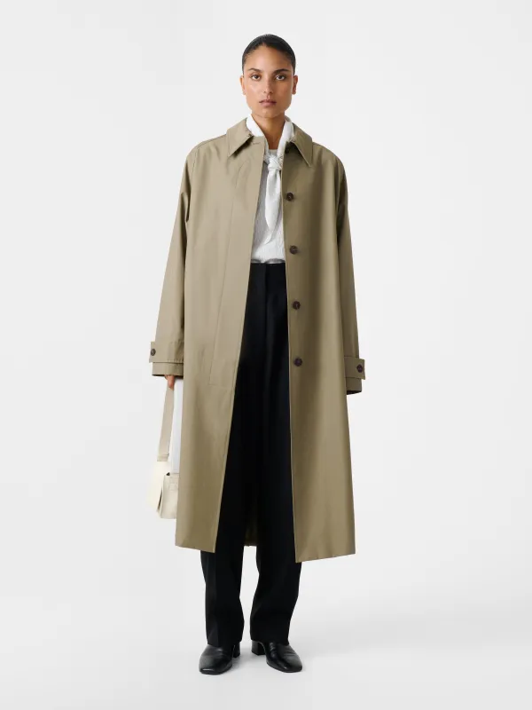 Holin Coated Cotton Trench in Dark Dusk made by Studio Nicholson