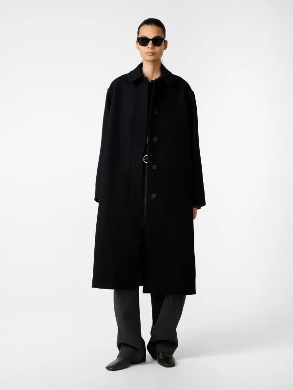 Ria Wool Coat in Black made by Studio Nicholson