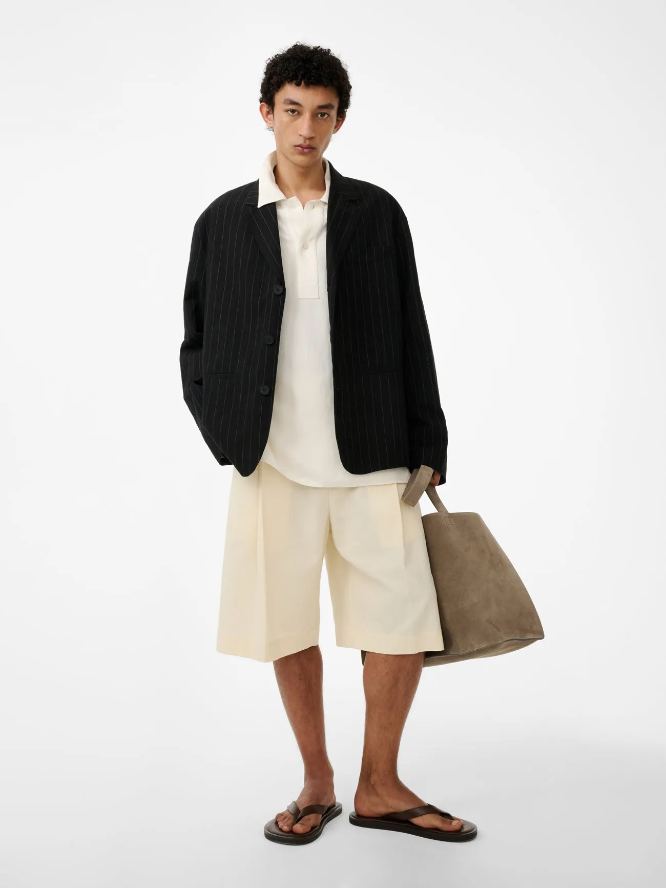 Austin Linen Polo Shirt in Chalk sold by Studio Nicholson product image thumbnail 5