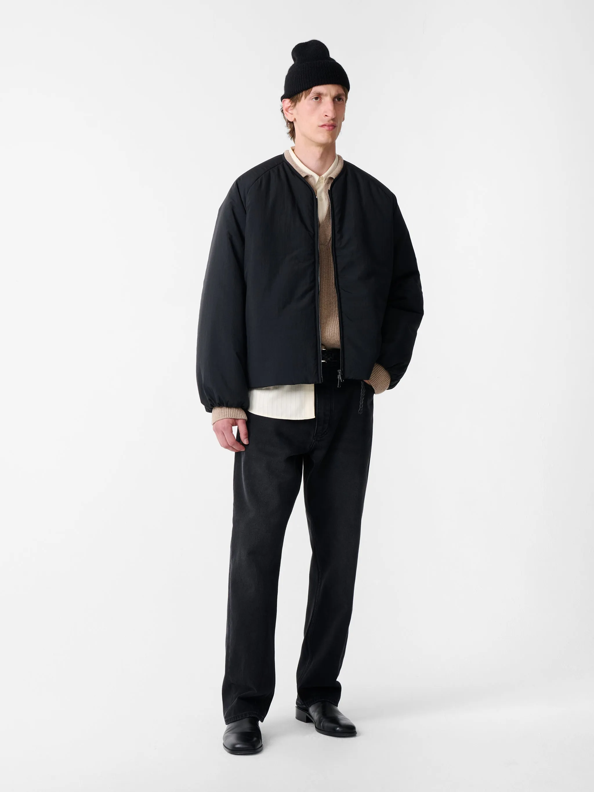 Nicio Puffer Jacket in Darkest Navy sold by Studio Nicholson