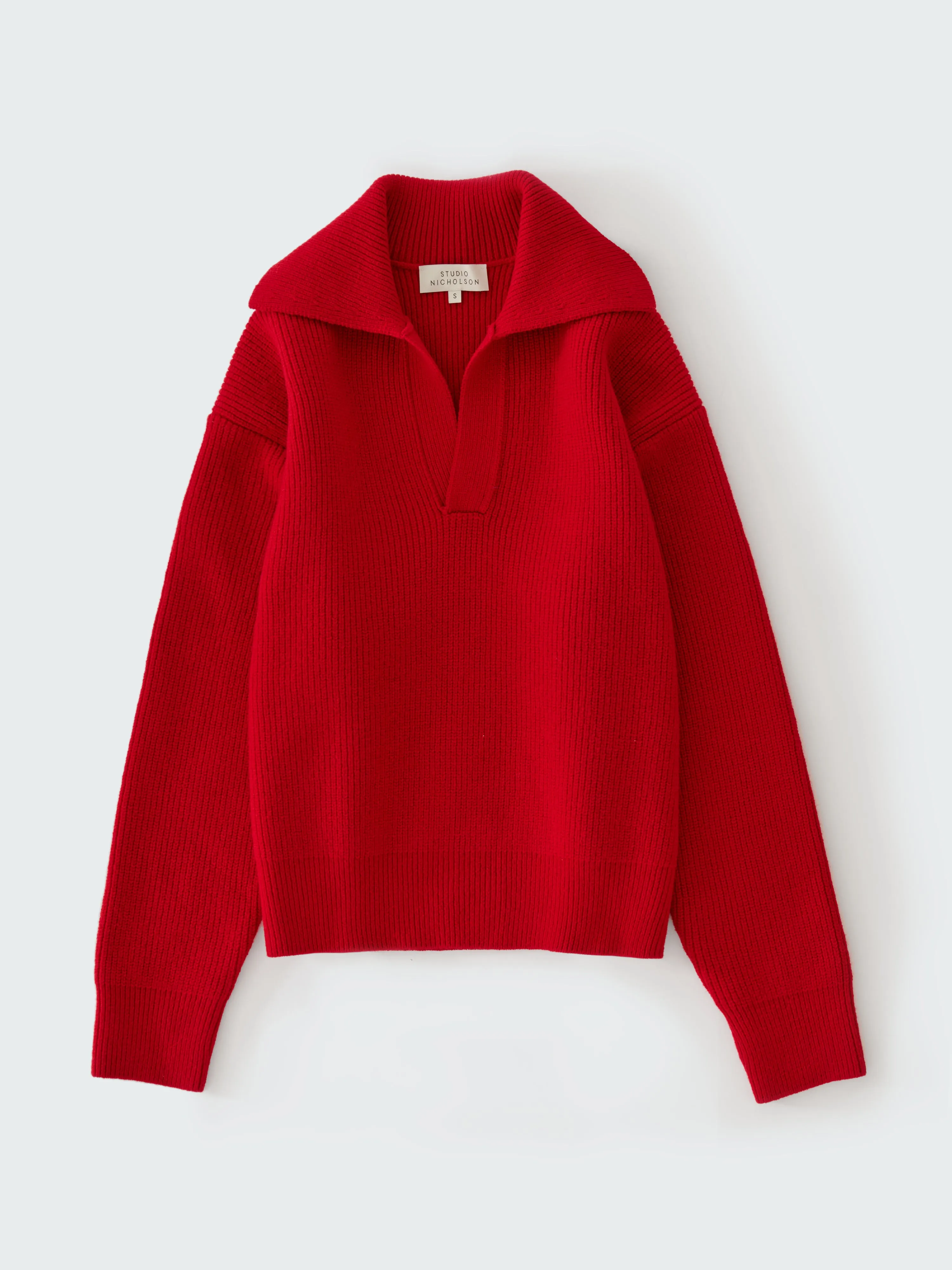 Nash Knit Polo in Crimson sold by Studio Nicholson