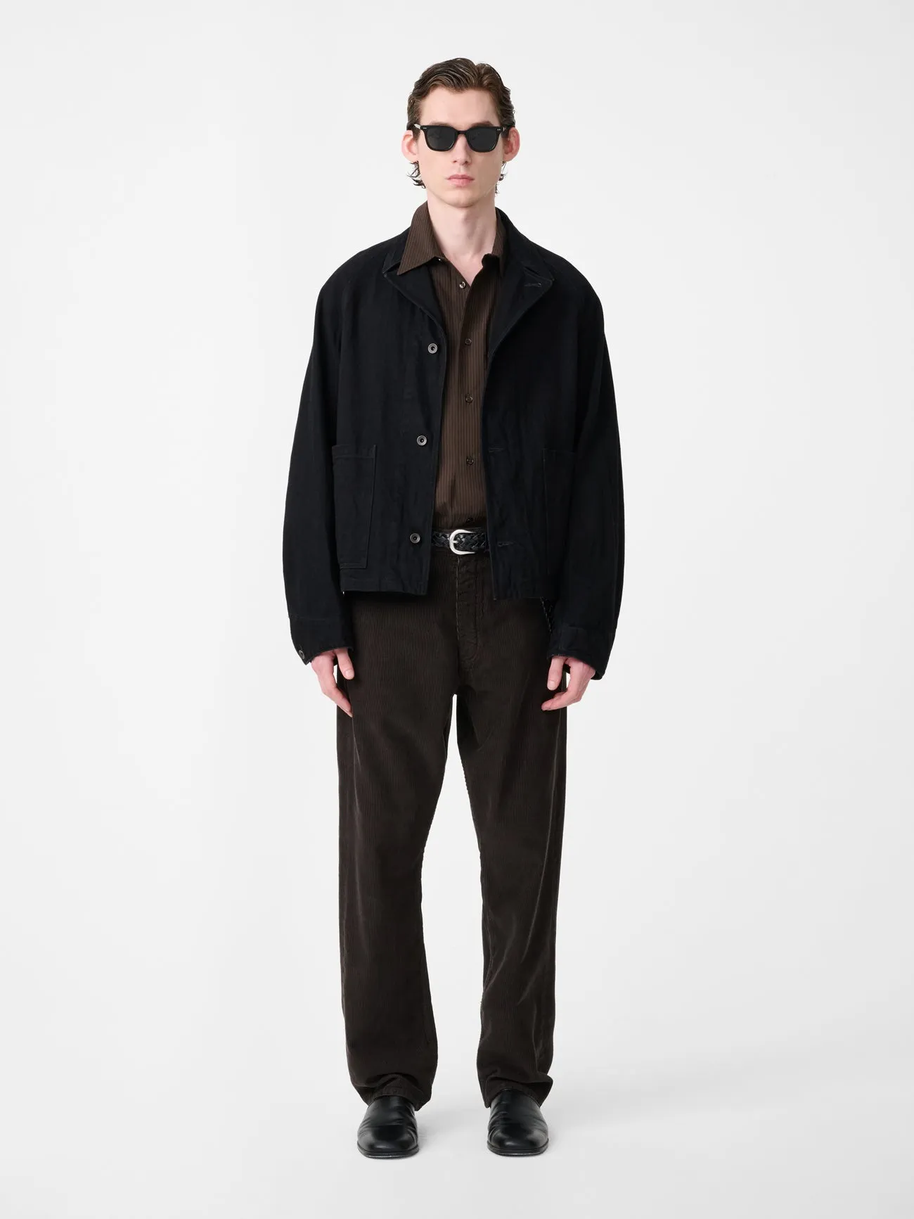 Coggan Crinkle Denim Jacket in Black sold by Studio Nicholson