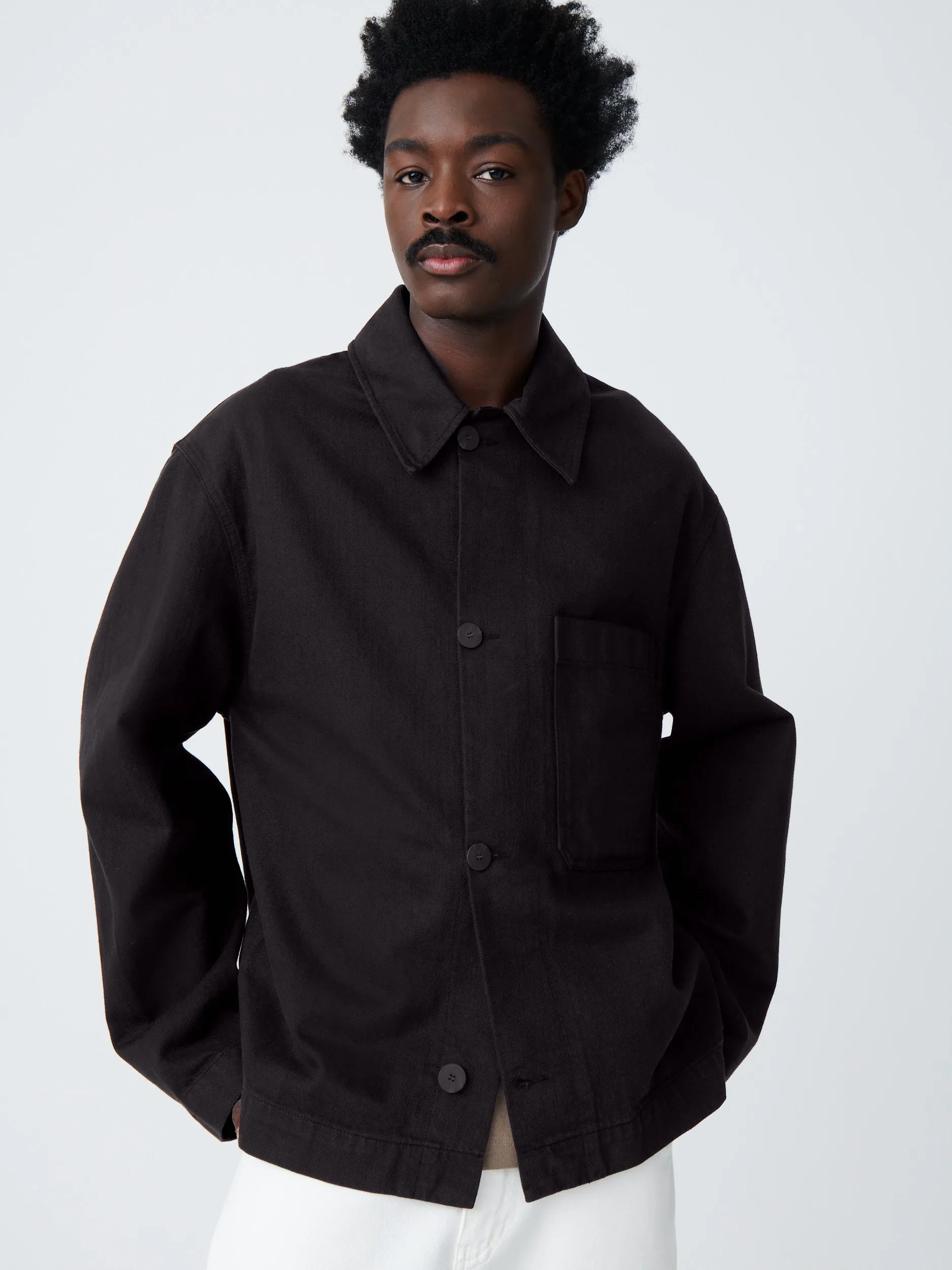 Ease Denim Jacket in Black Grape sold by Studio Nicholson