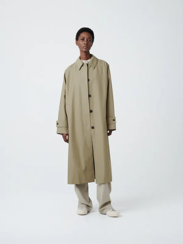 Holin Coated Cotton Coat in Birch sold by Studio Nicholson