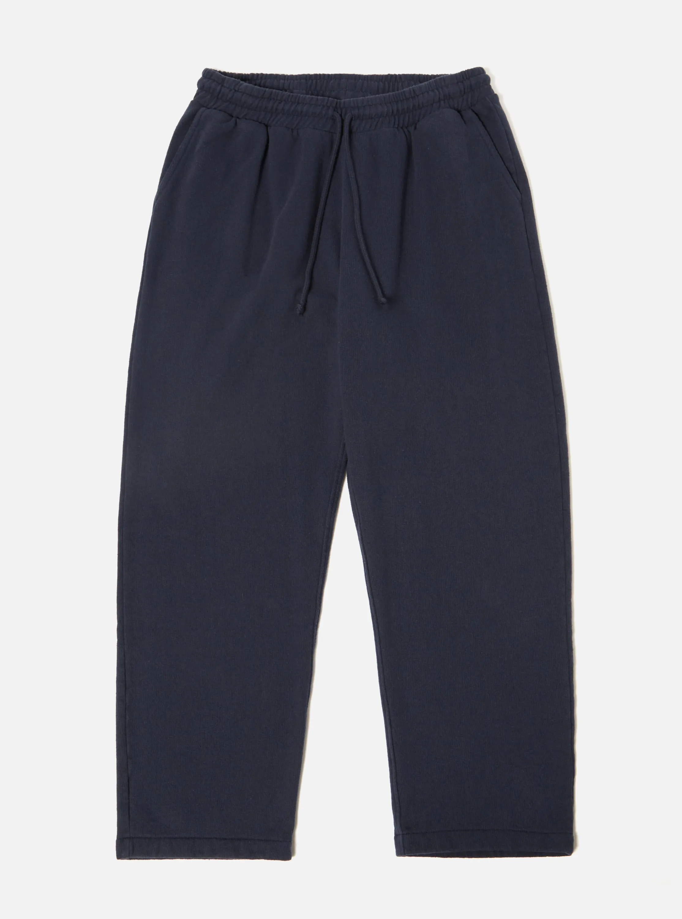 Universal Works Oxford Track Pant in Navy Dry Handle Brushback sold by Universal Works
