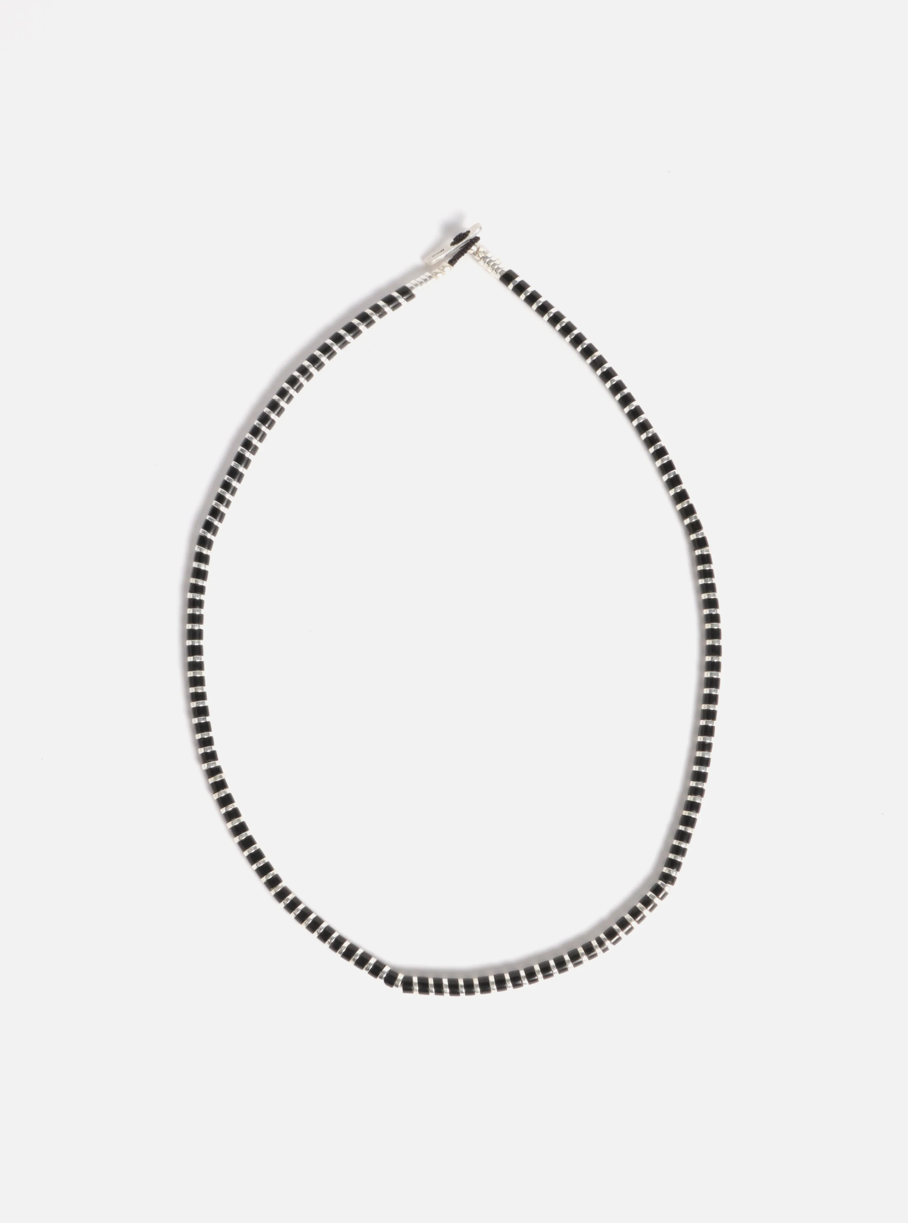 Mikia Heishi Hematite Necklace in Jet/Hematite/Sterling Silver sold by Universal Works