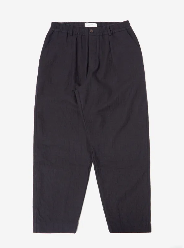 Universal Works Pleated Track Pant in Navy Wool/Cotton Check Seersucker sold by Universal Works