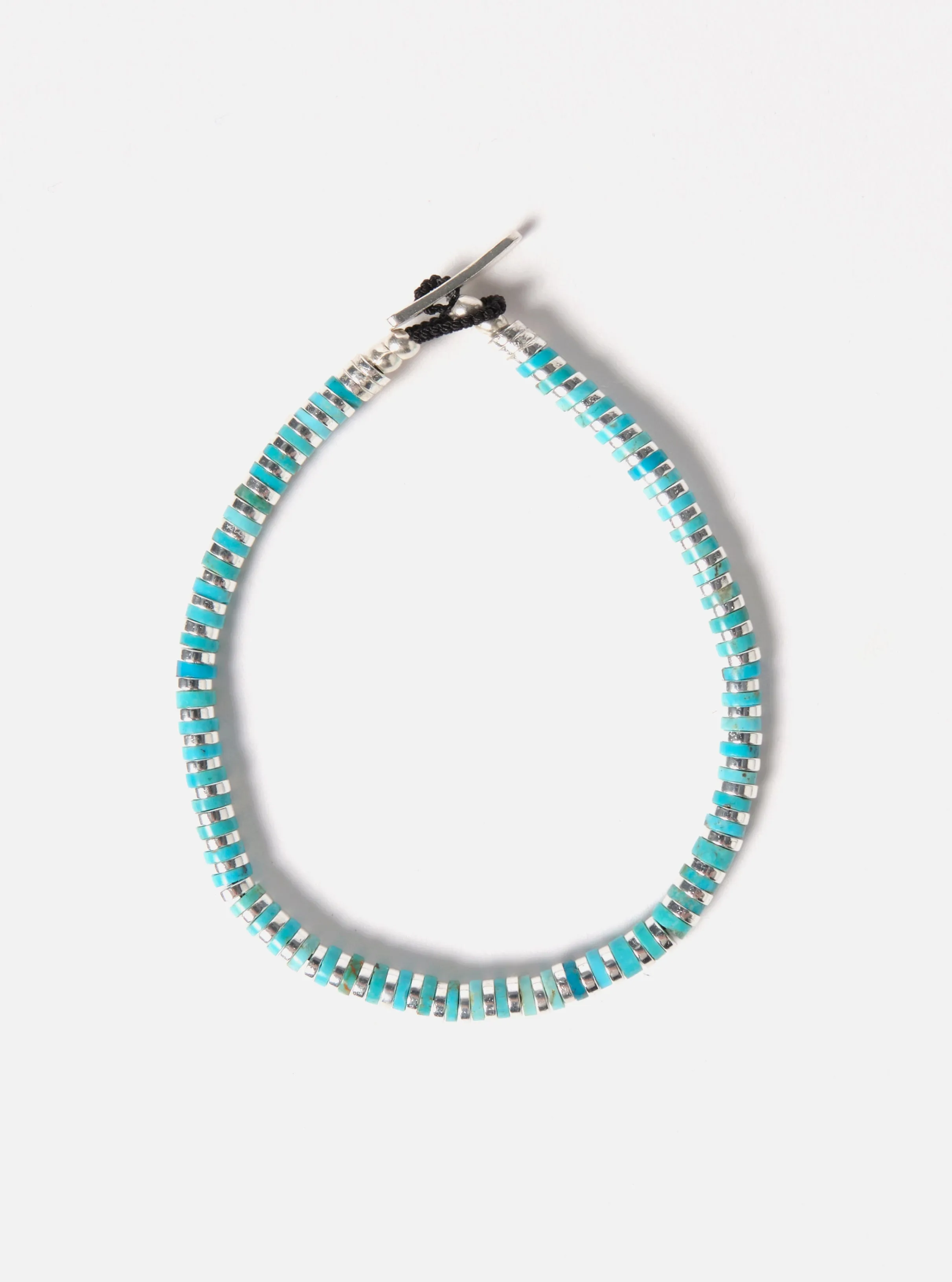 Mikia Heishi Bracelet in Turquoise/Hematite/Sterling Silver sold by Universal Works