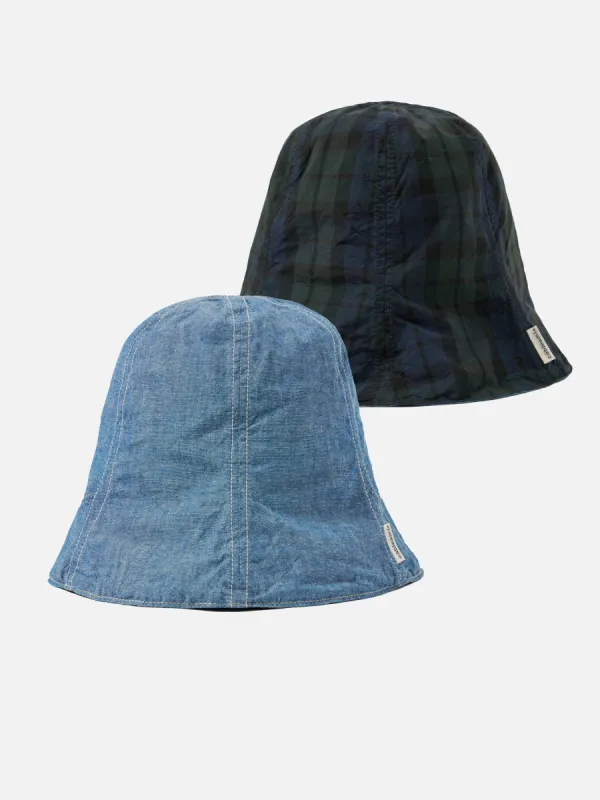 cableami® Reversible Tulip Hat in Indigo/Blackwatch 5oz Chambray/Cordura sold by Universal Works