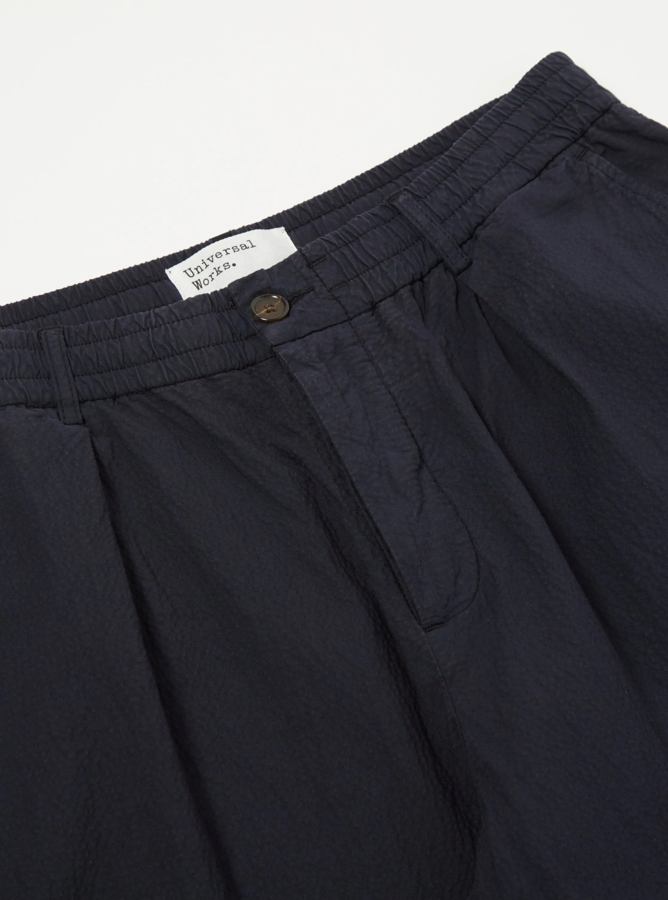 Universal Works Pleated Track Pant in Navy Seersucker II sold by Universal Works product image thumbnail 4