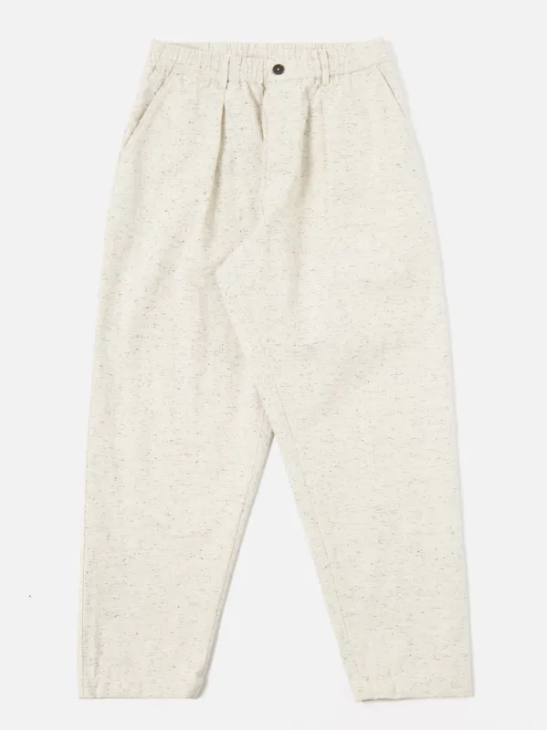 Universal Works Pleated Track Pant in Ecru Salt & Pepper Gabardine sold by Universal Works