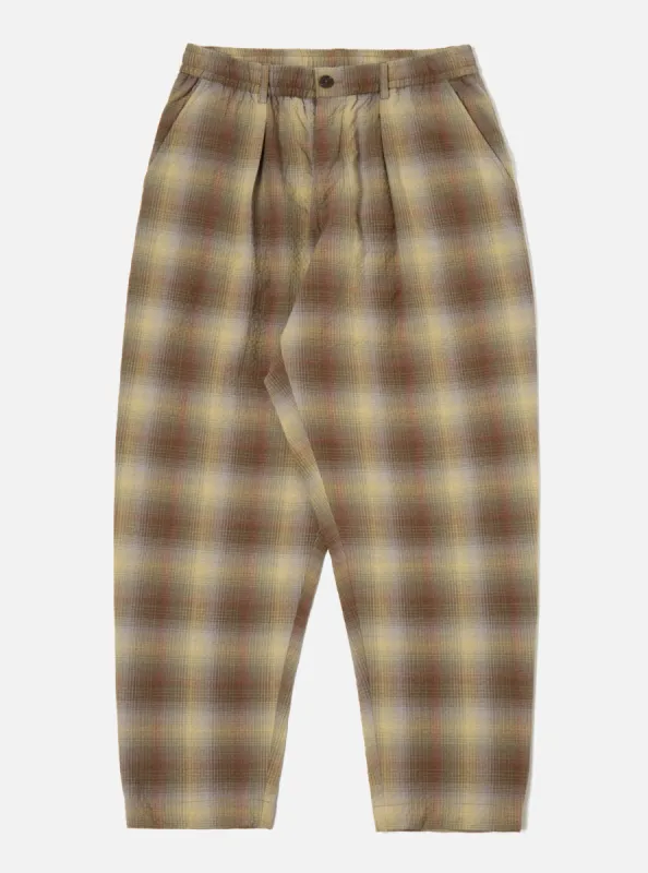 Universal Works Pleated Track Pant in Olive Portuguese Check Seersucker sold by Universal Works