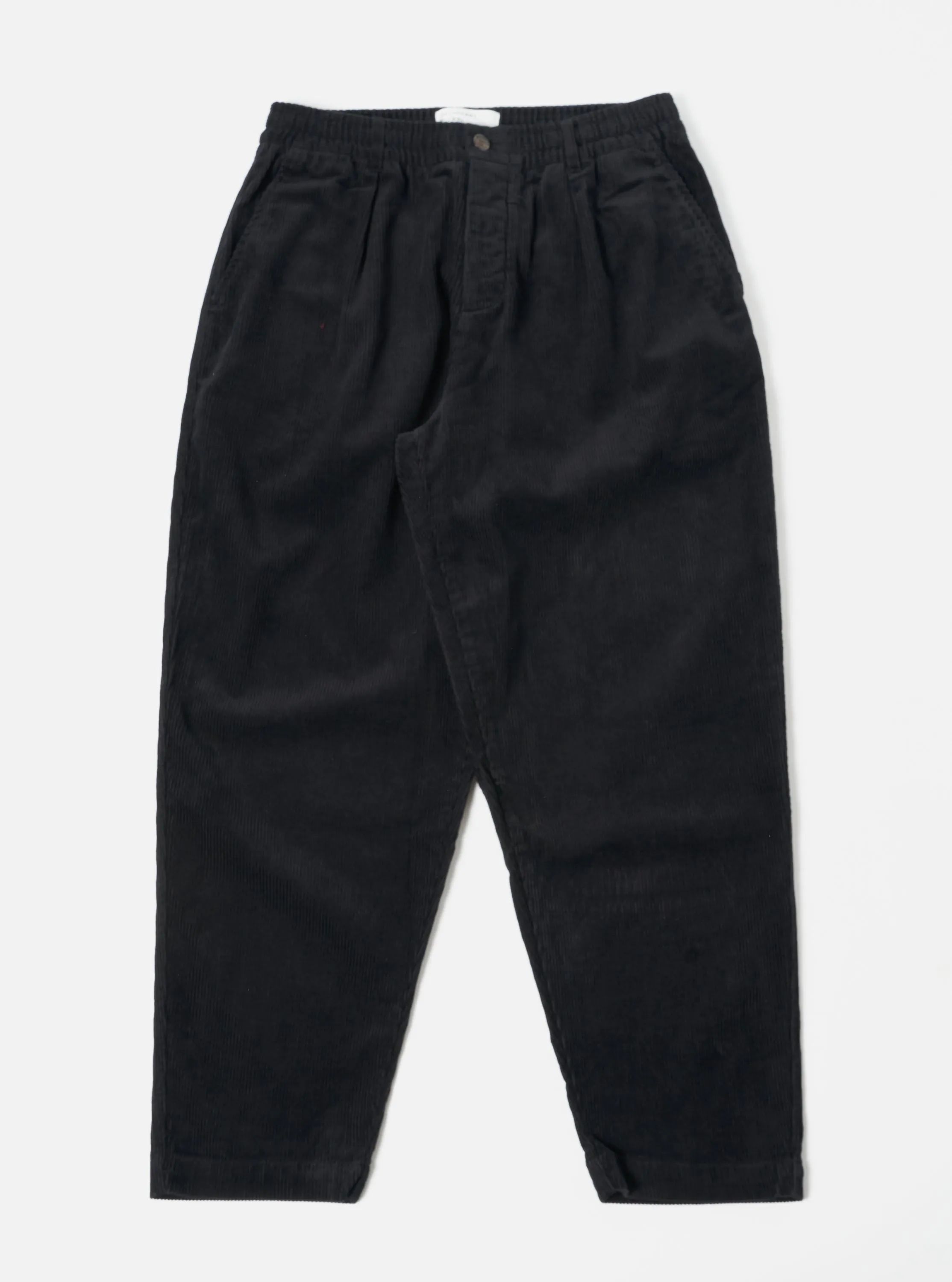 Universal Works Pleated Track Pant in Black Cord sold by Universal Works