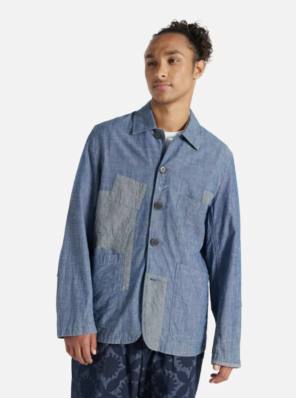 Universal Works Patched Bakers Jacket in Indigo Chambray/Hickory Stripe Denim sold by Universal Works