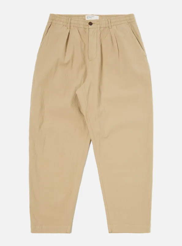 Universal Works Pleated Track Pant in Summer Oak Seersucker II sold by Universal Works