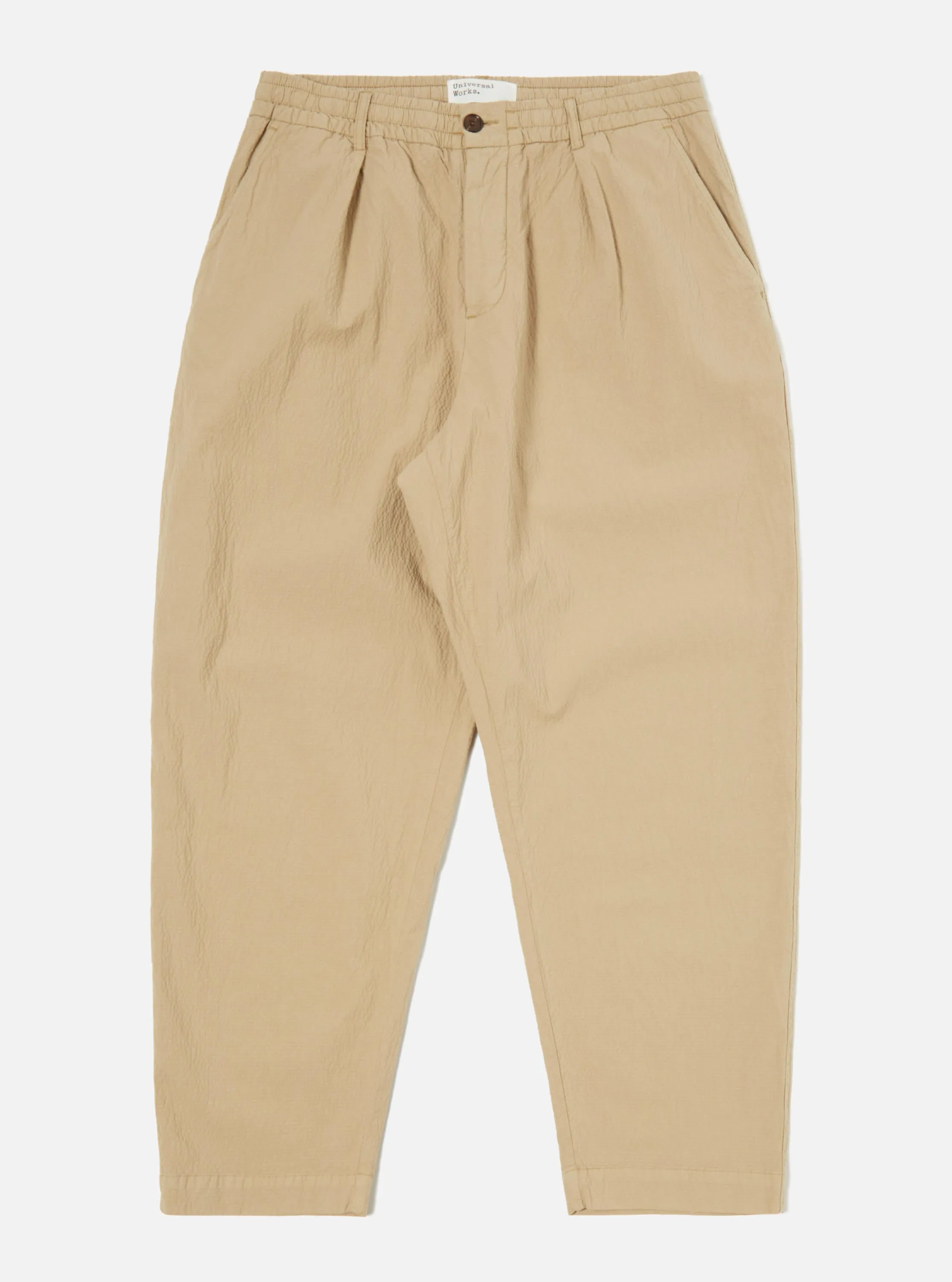 Universal Works Pleated Track Pant in Summer Oak Seersucker II sold by Universal Works