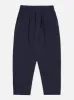 Universal Works Pleated Track Pant in Navy Brushed Moleskin sold by Universal Works