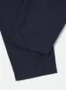 Universal Works Pleated Track Pant in Navy Brushed Moleskin sold by Universal Works