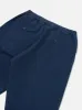 Universal Works Pleated Track Pant in Navy Super Twill sold by Universal Works