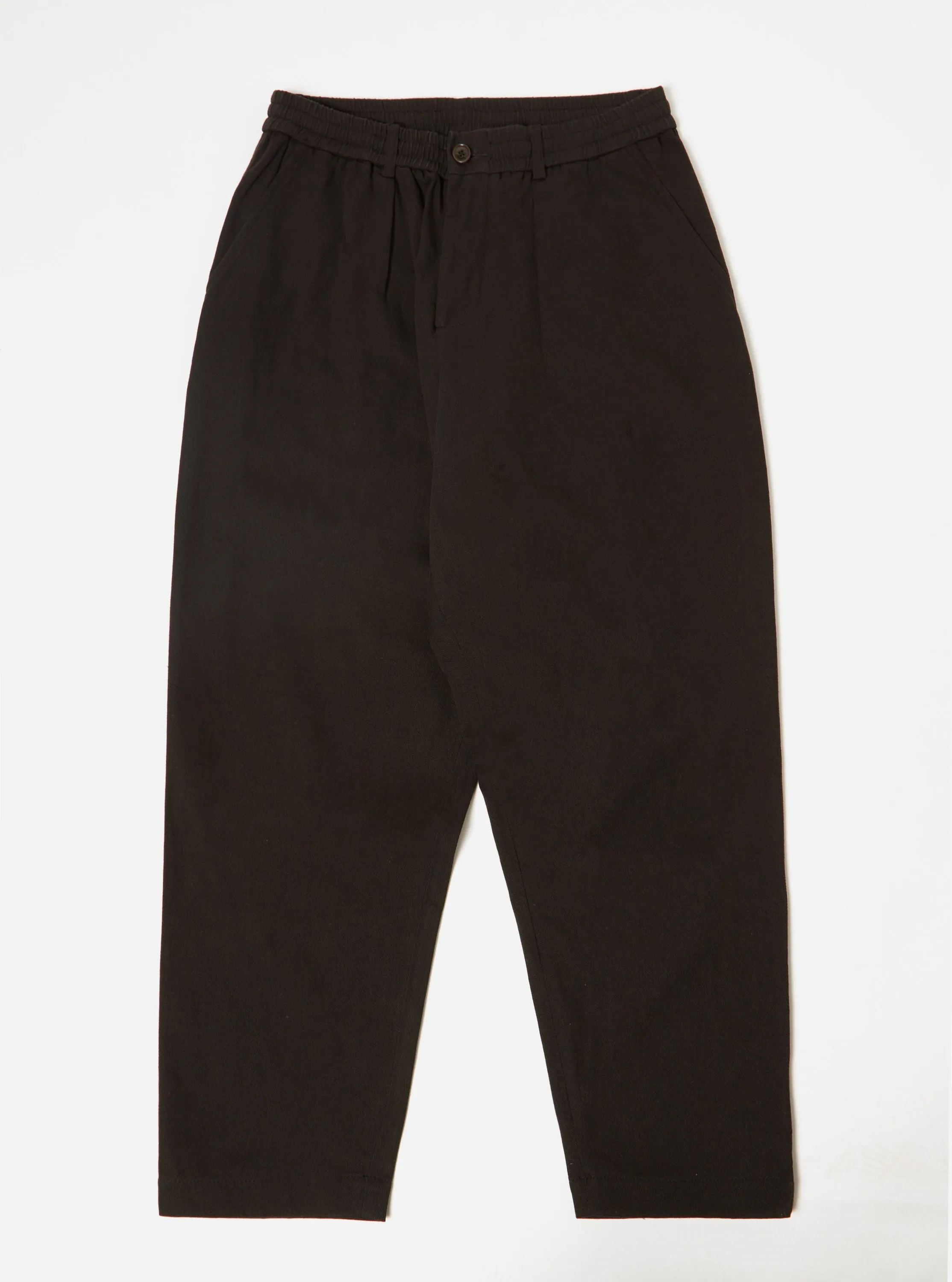 Universal Works Pleated Track Pant in Black Winter Twill sold by Universal Works