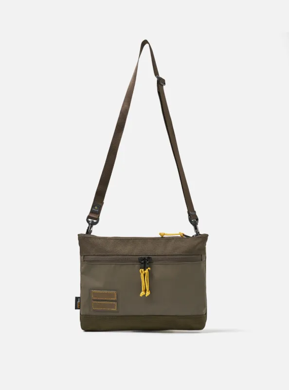 master-piece x Universal Works Shoulder Bag in Olive Recycled Tech Canvas sold by Universal Works