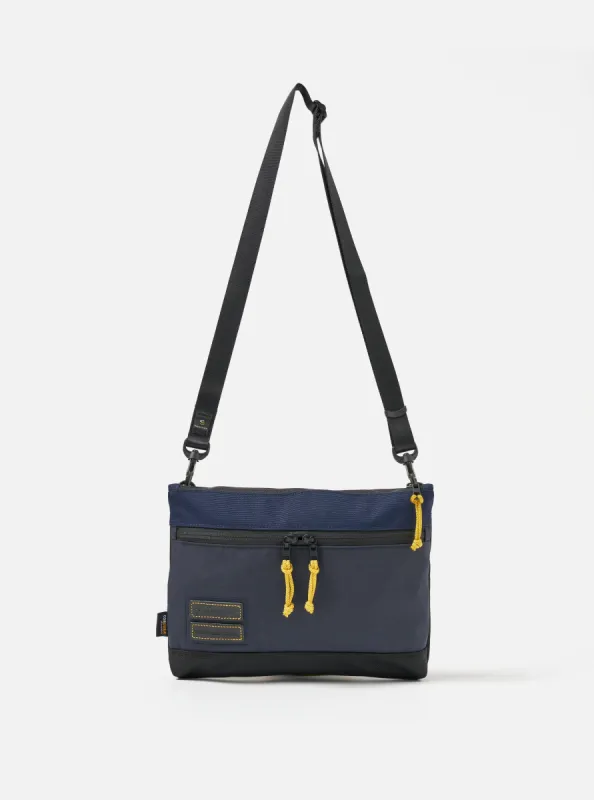 master-piece x Universal Works Shoulder Bag in Navy Recycled Tech Canvas sold by Universal Works