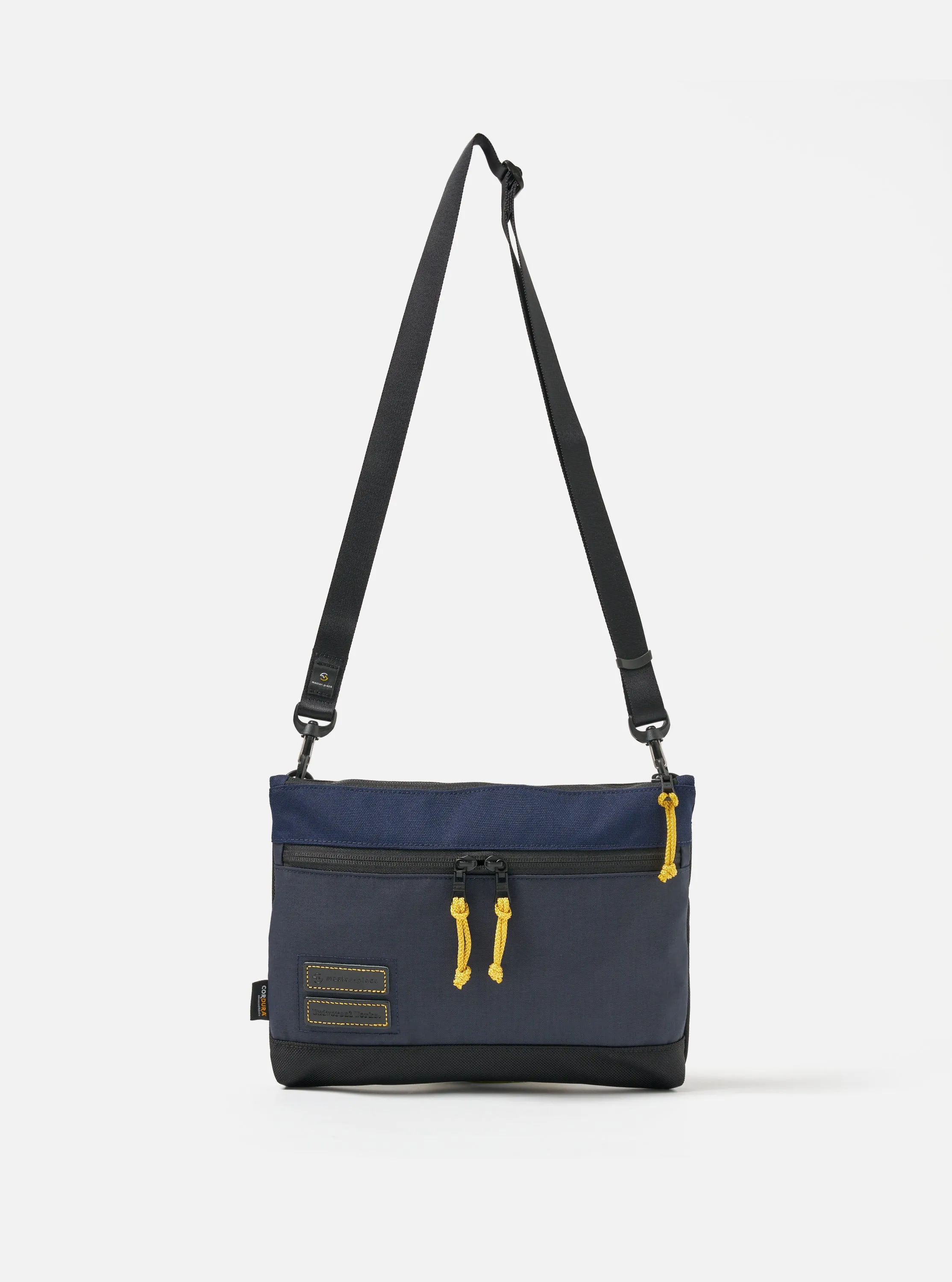 master-piece x Universal Works Shoulder Bag in Navy Recycled Tech Canvas sold by Universal Works