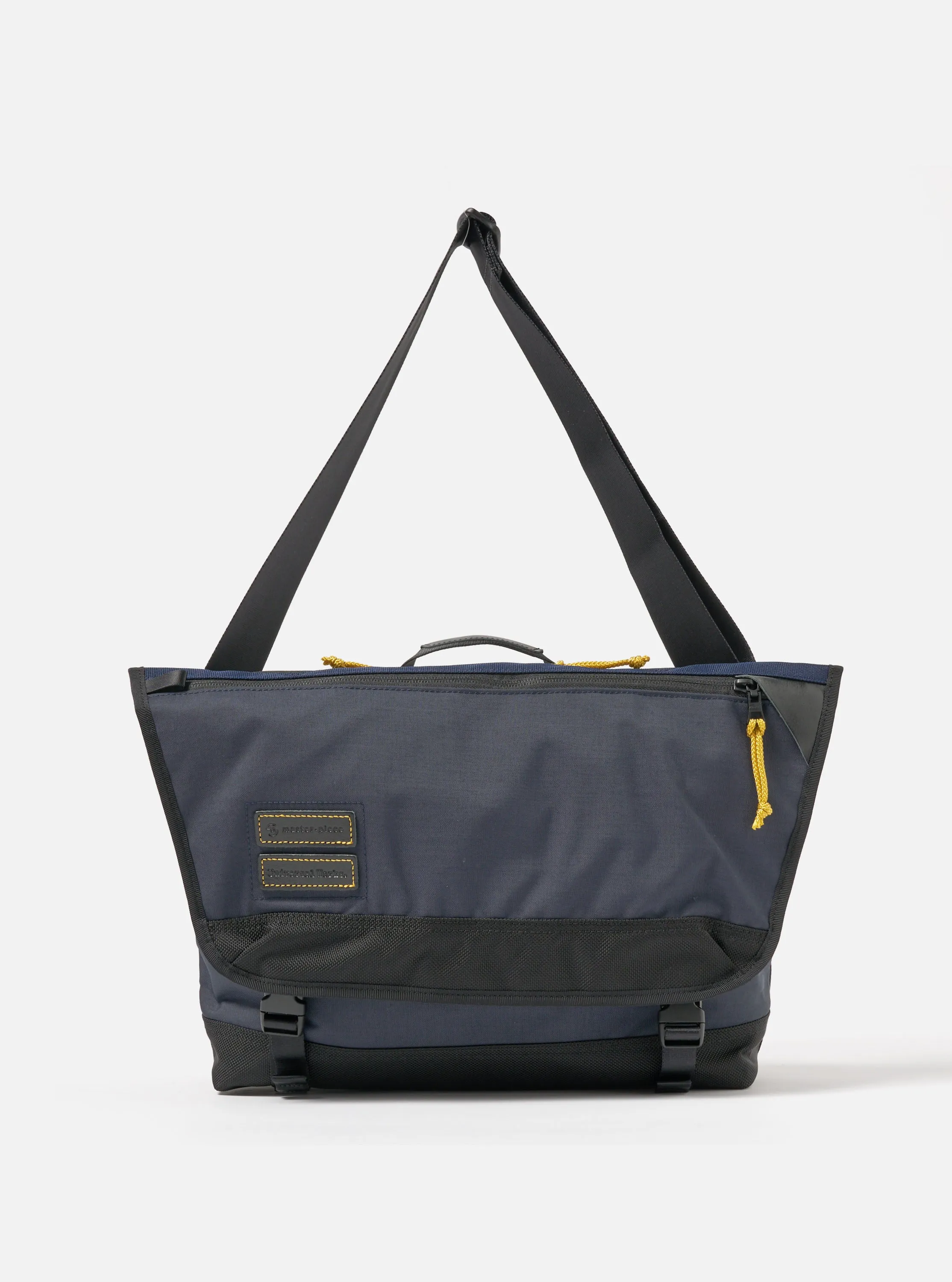 master-piece x Universal Works Courier Bag in Navy Recycled Tech Canvas sold by Universal Works