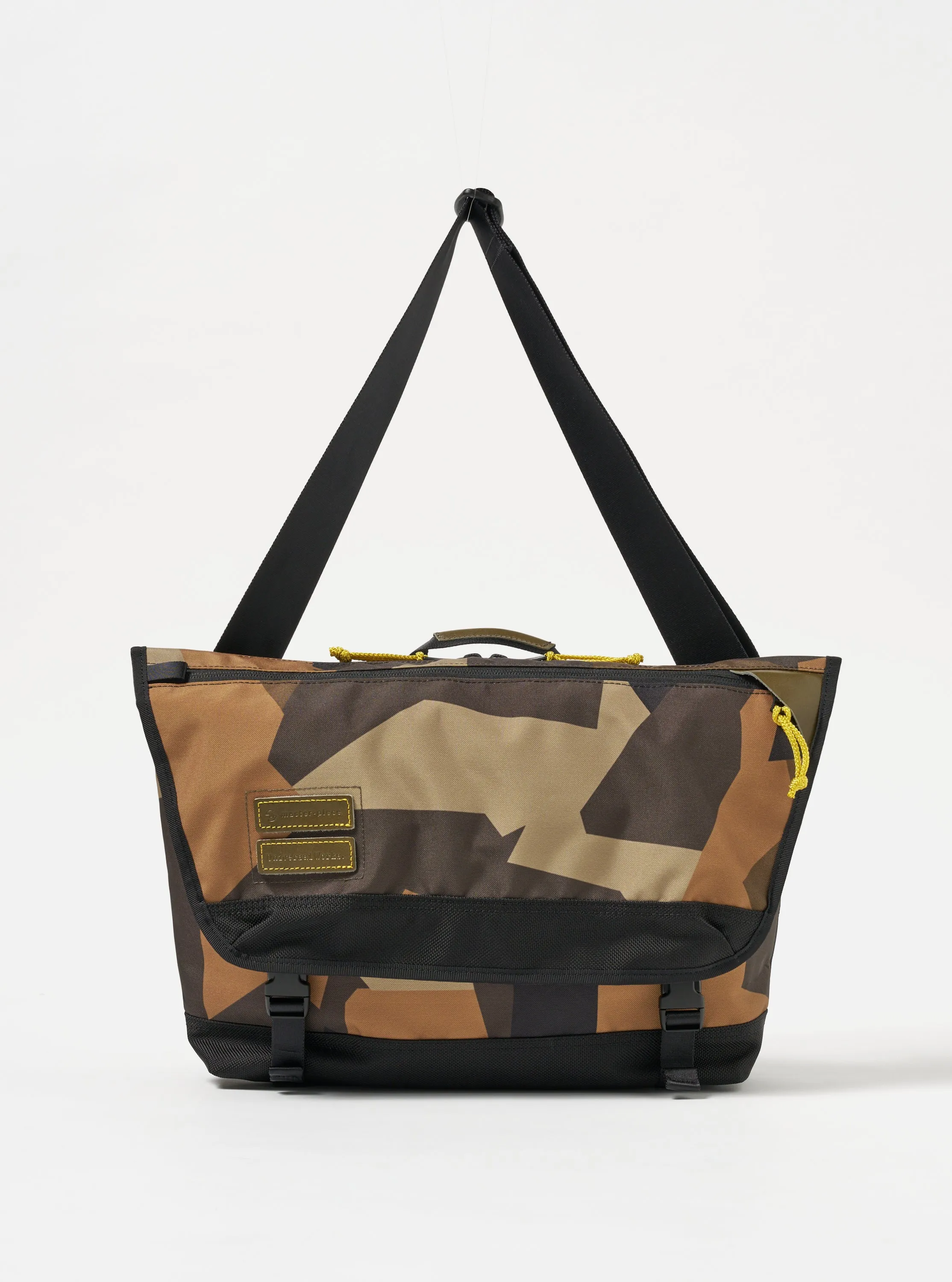 master-piece x Universal Works Courier Bag in Camo Recycled Tech Canvas sold by Universal Works