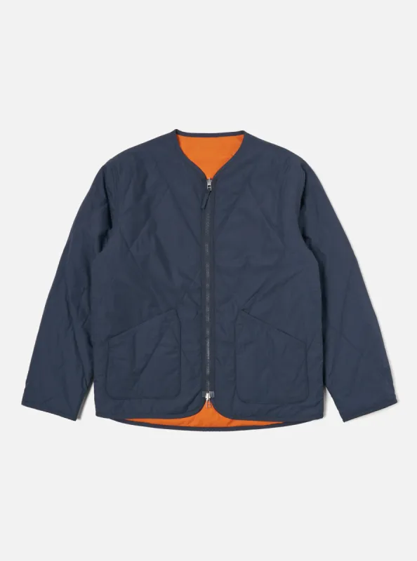 Universal Works Reversible Military Liner Jacket in Navy/Orange Recycled Polytech sold by Universal Works