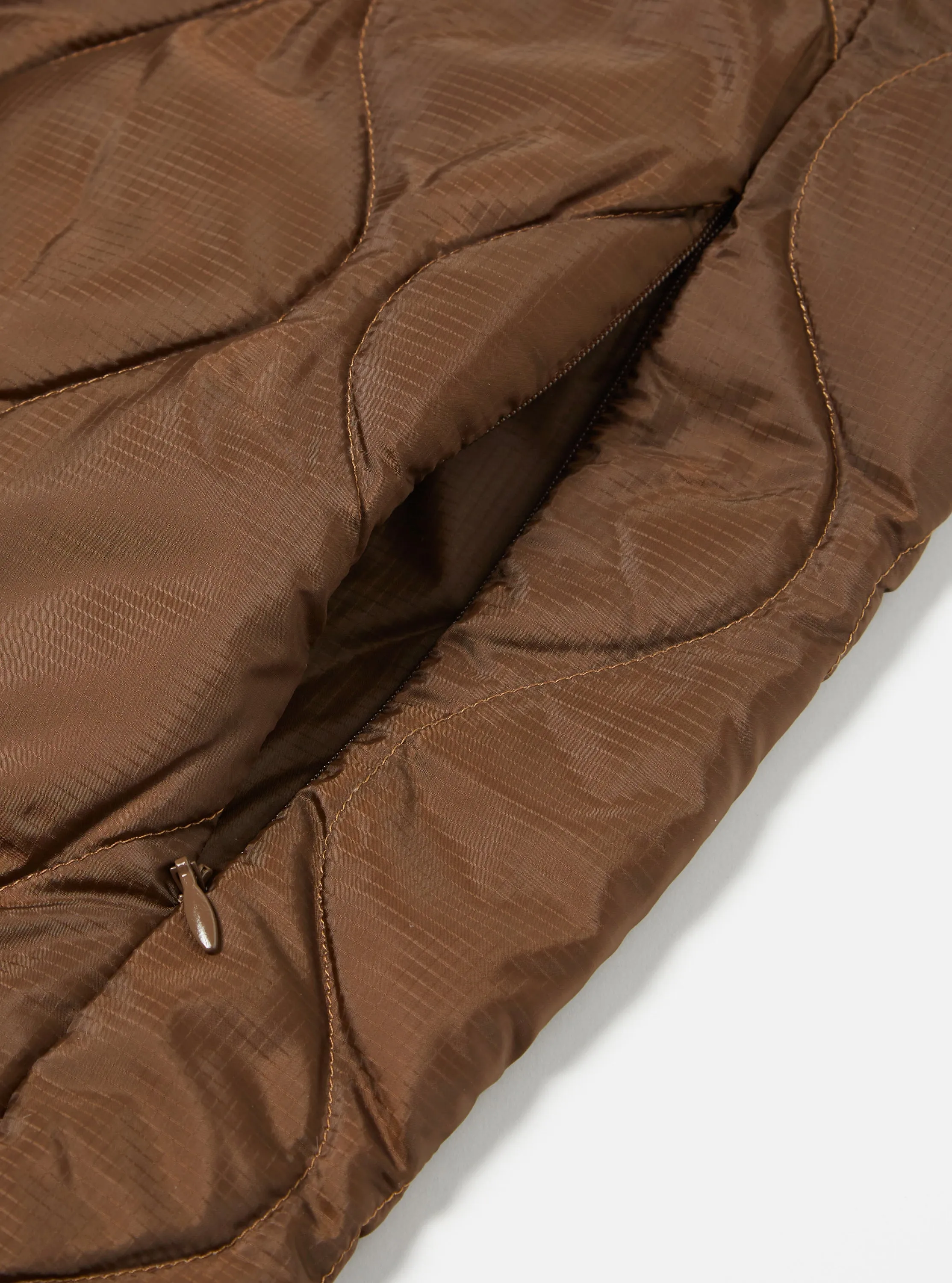 Taion by F/CE. Packable Down Vest in Brown Nylon Ripstop/Duck Down sold by Universal Works product image thumbnail 4