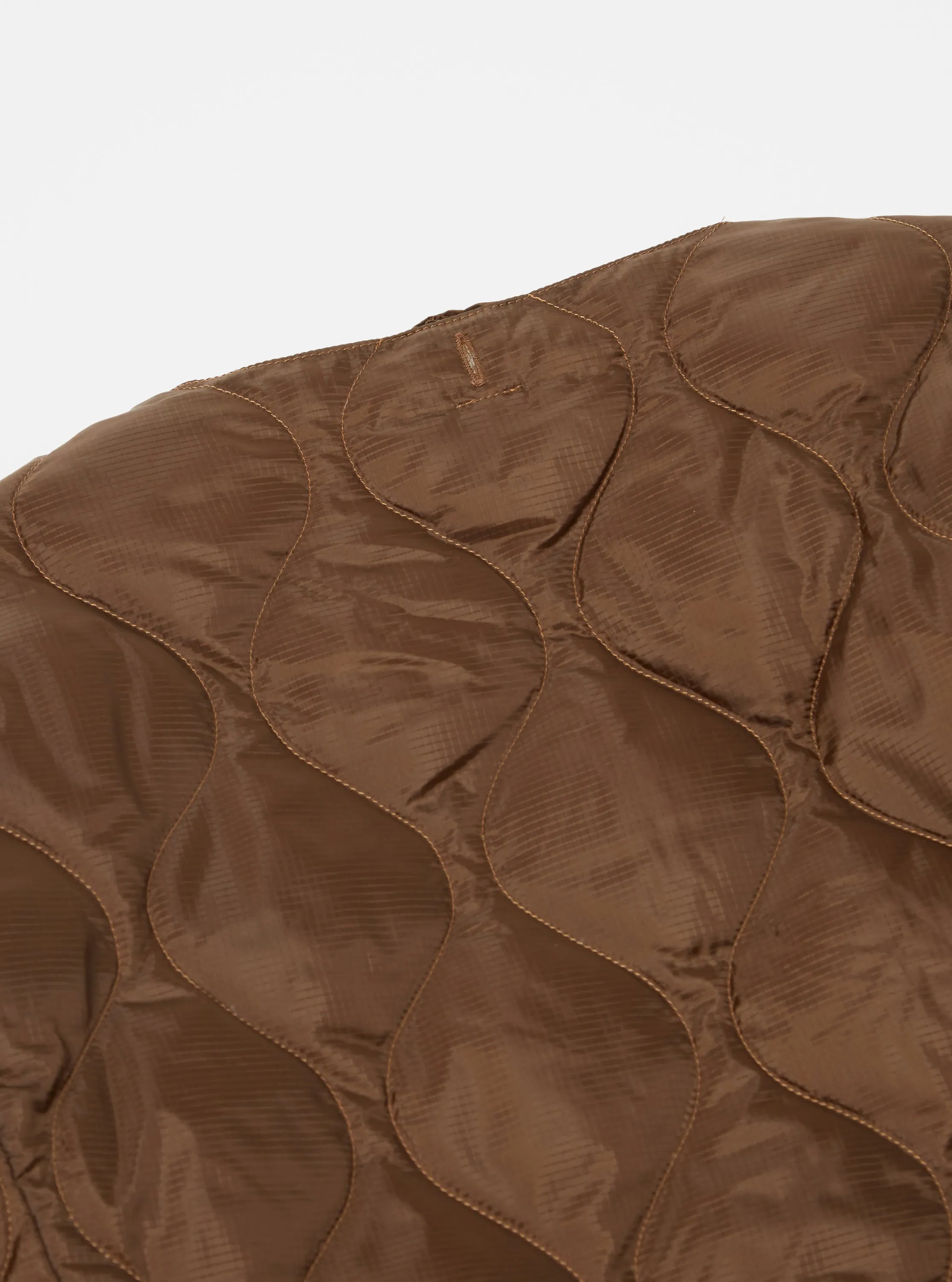 Taion by F/CE. Packable Inner Down Jacket in Brown Nylon Ripstop/Duck Down sold by Universal Works product image thumbnail 4