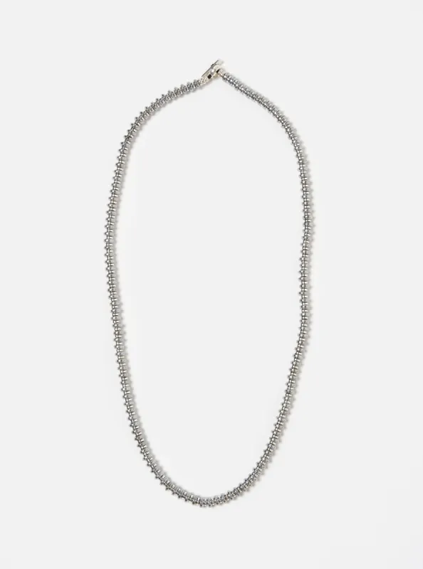 Mikia Necklace Hematite Roundel in Hematite sold by Universal Works