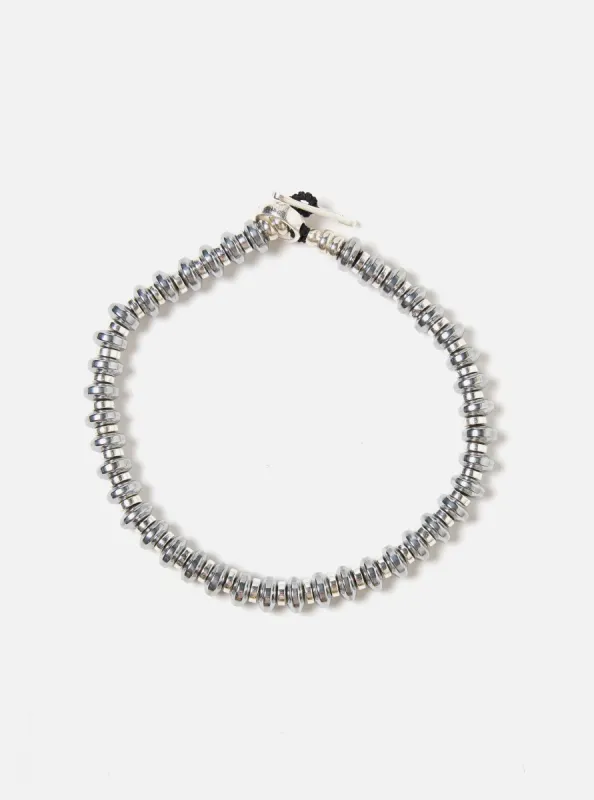 Mikia Bracelet Hematite Roundel in Hematite sold by Universal Works