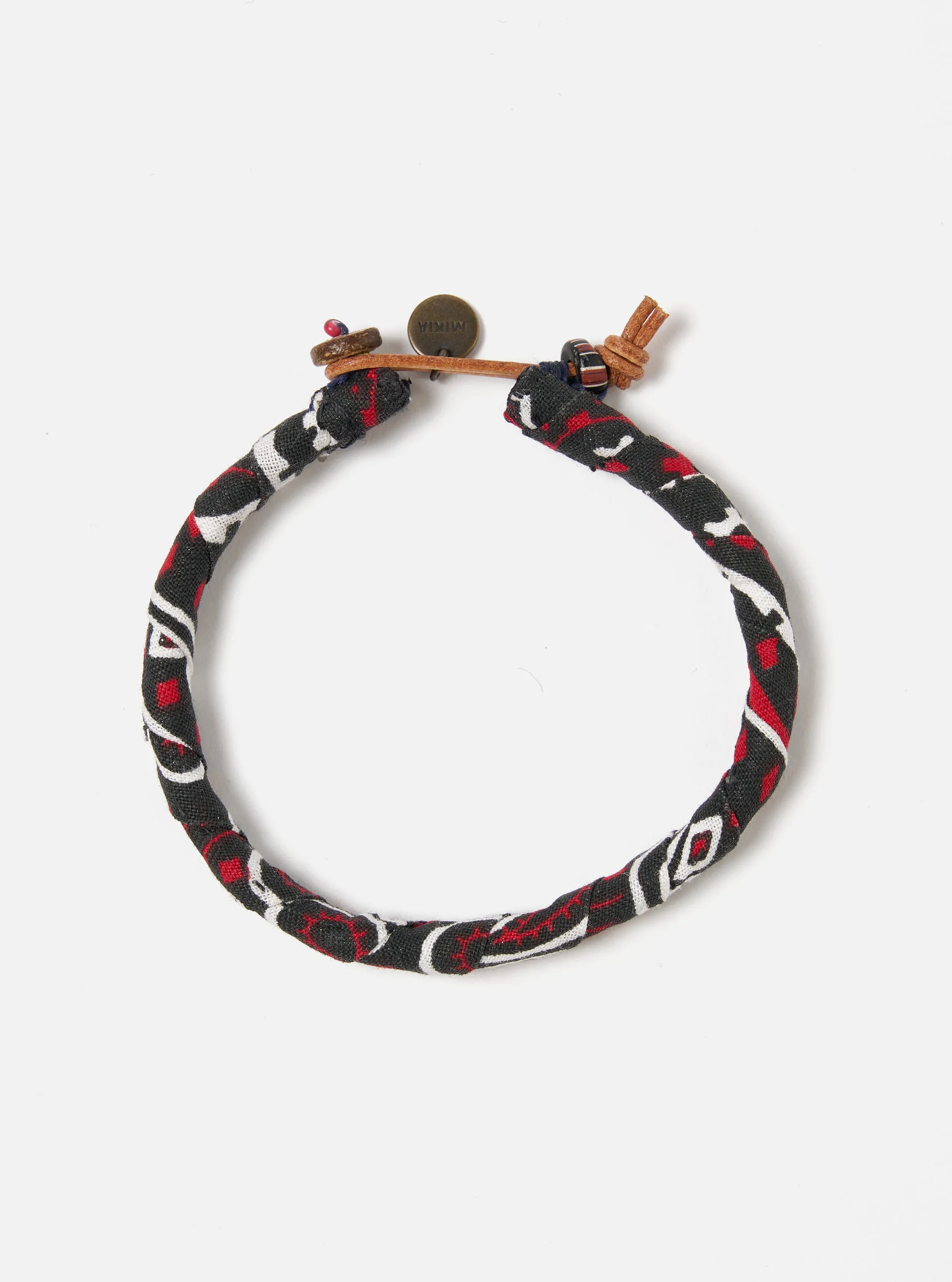 Mikia Bracelet in Black/Red Bandana sold by Universal Works