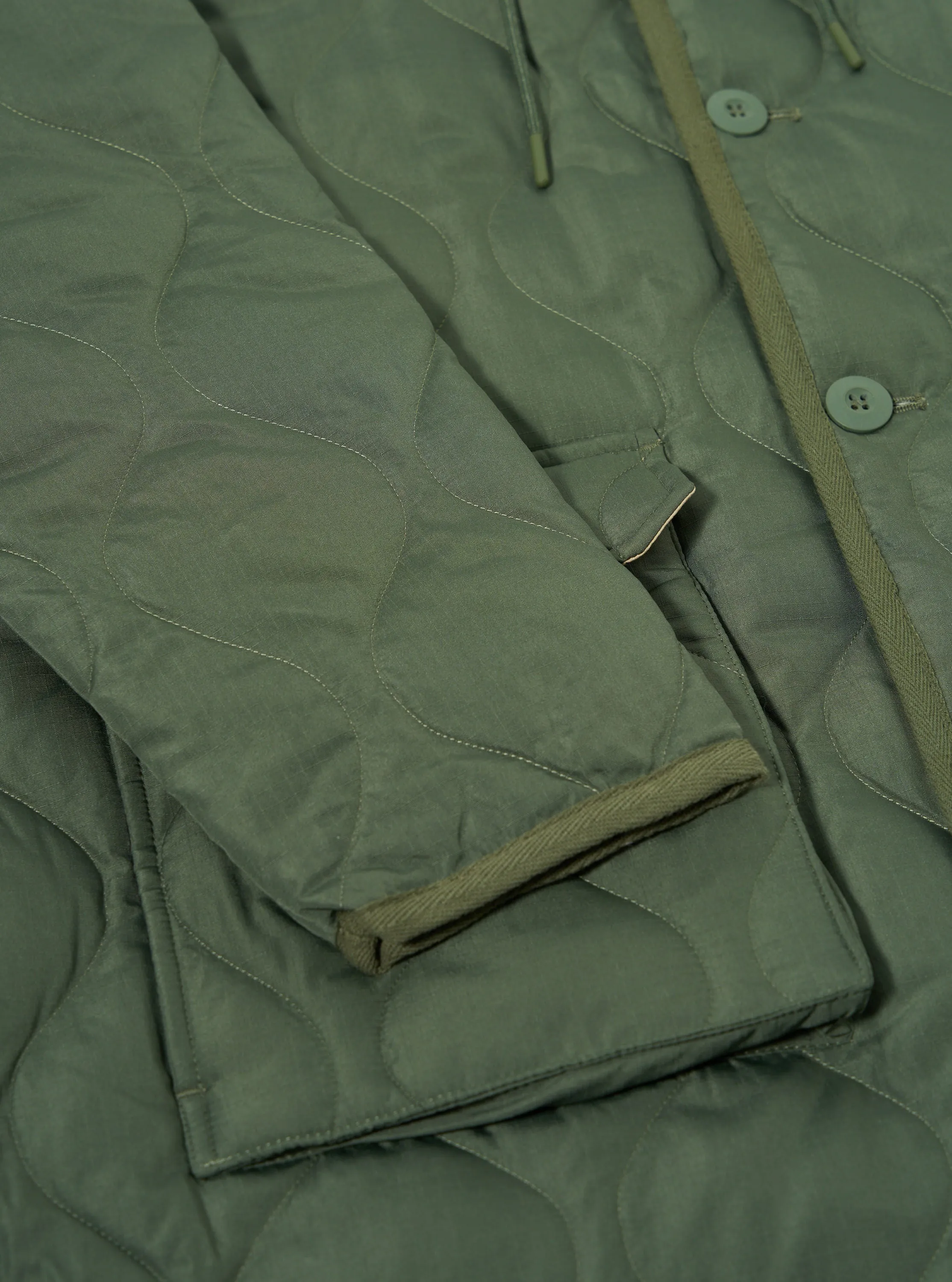 Taion Military Hood Long Down Jacket in Olive Ripstop sold by Universal Works product image thumbnail 5